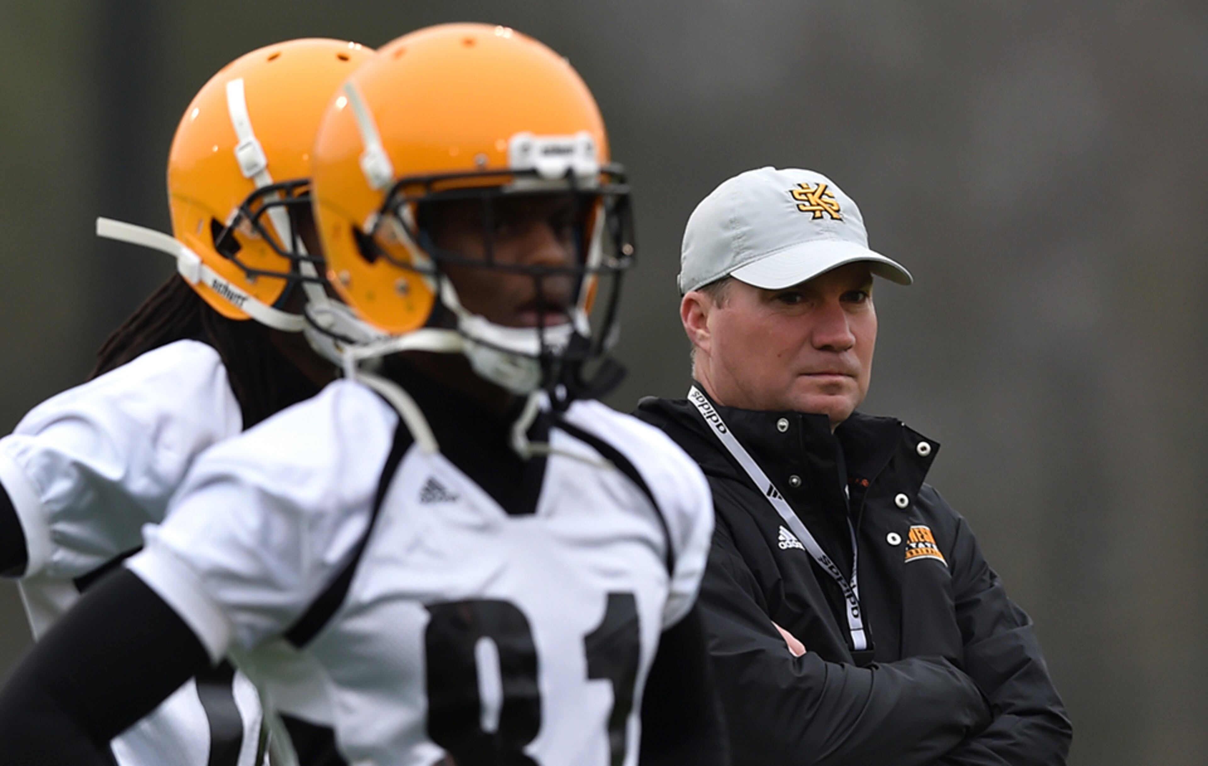 Kennesaw State head coach Brian Bohannon watches over the team during its first spring practice Monday in Kennesaw.