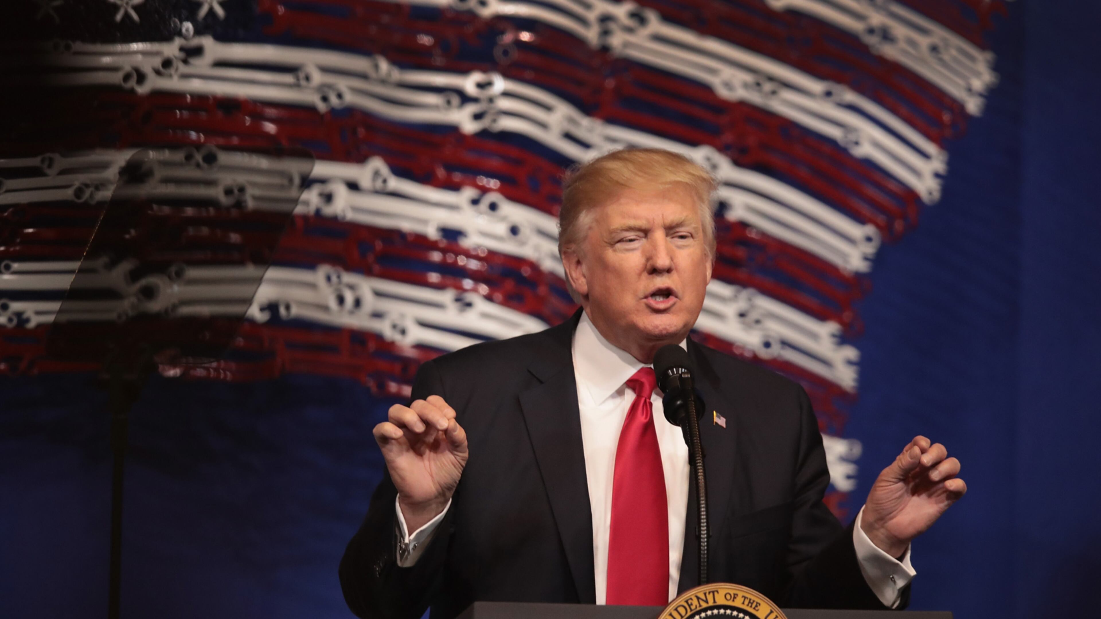 KENOSHA, WI - APRIL 18: President Donald Trump speaks to workers at the headquarters of tool manufacturer Snap-On on April 18, 2017 in Kenosha, Wisconsin. During the visit, Trump signed an executive order to try to bring jobs back to American workers and revamp the H-1B visa guest worker program. (Photo by Scott Olson/Getty Images)