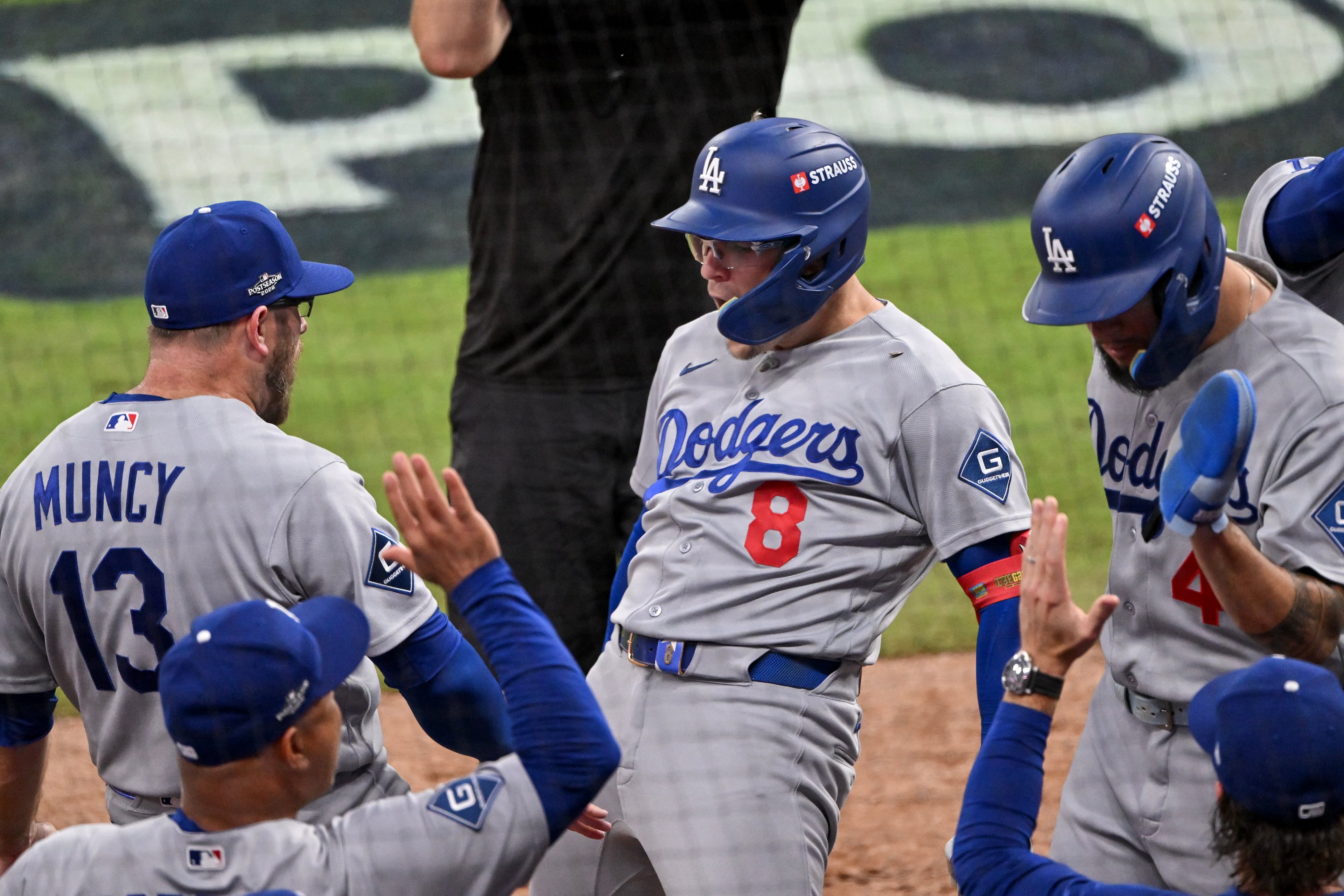 Los Angeles Dodgers third baseman Enrique Hernández (8) celebrates at the dugout after hitting a two-run home run against the Atlanta Braves during the fourth inning of Game 3 of the MLB National League Division Series between the Atlanta Braves and the Los Angeles Dodgers, Tuesday, Oct. 6, 2026, in Atlanta. (Hyosub Shin/AJC)