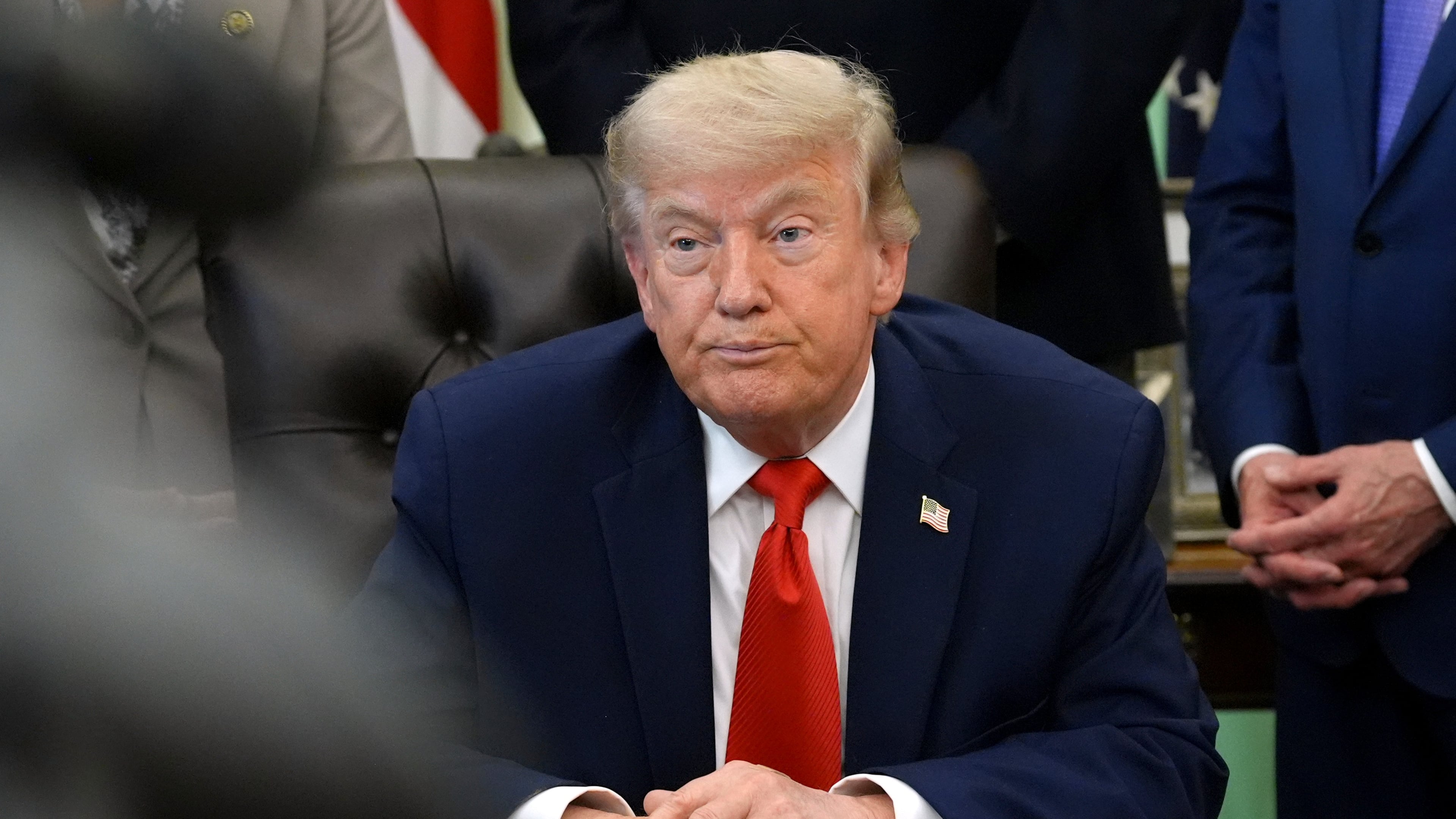 President Donald Trump listens during an event to sign a proclamation about the fishing industry, in the Oval Office of the White House, Thursday, June 11, 2026, in Washington. (AP Photo/Jacquelyn Martin)