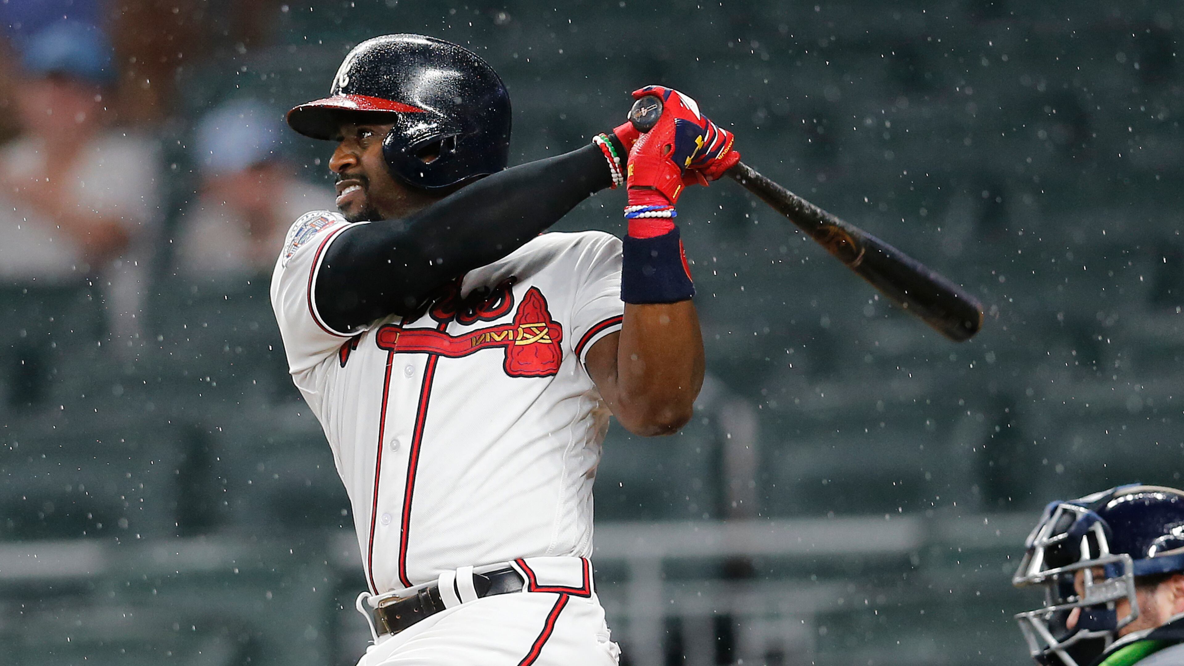 Braves’ Brandon Phillips (4) drives in a run with a double during the fifth inning of the team’s baseball game against the Milwaukee Brewers on Friday, June 23, 2017, in Atlanta. (AP Photo/John Bazemore)