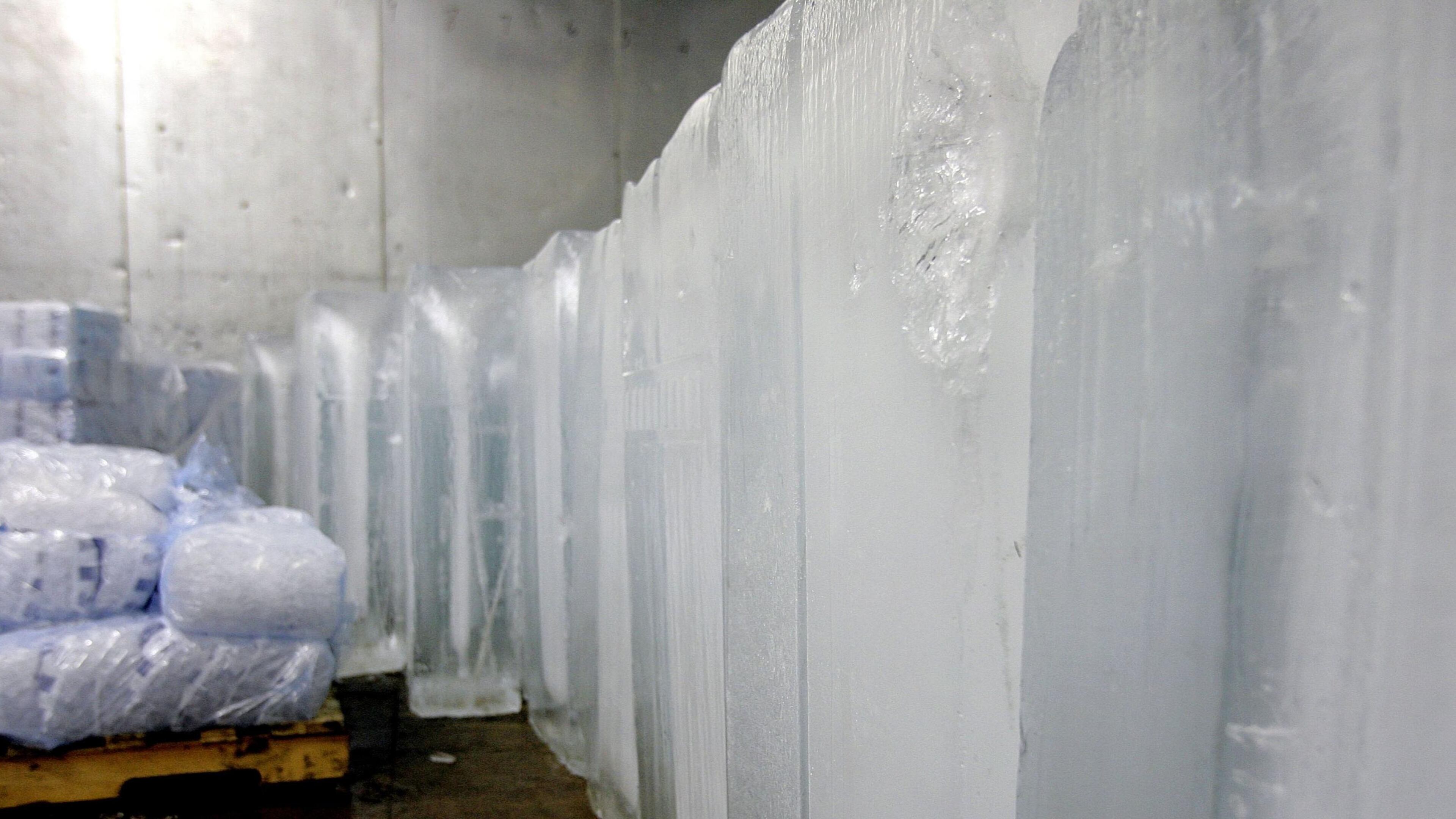 A man allegedly jumped out of a walk-in freezer at a Manhattan restaurant and attacked employees Sunday morning, police said.