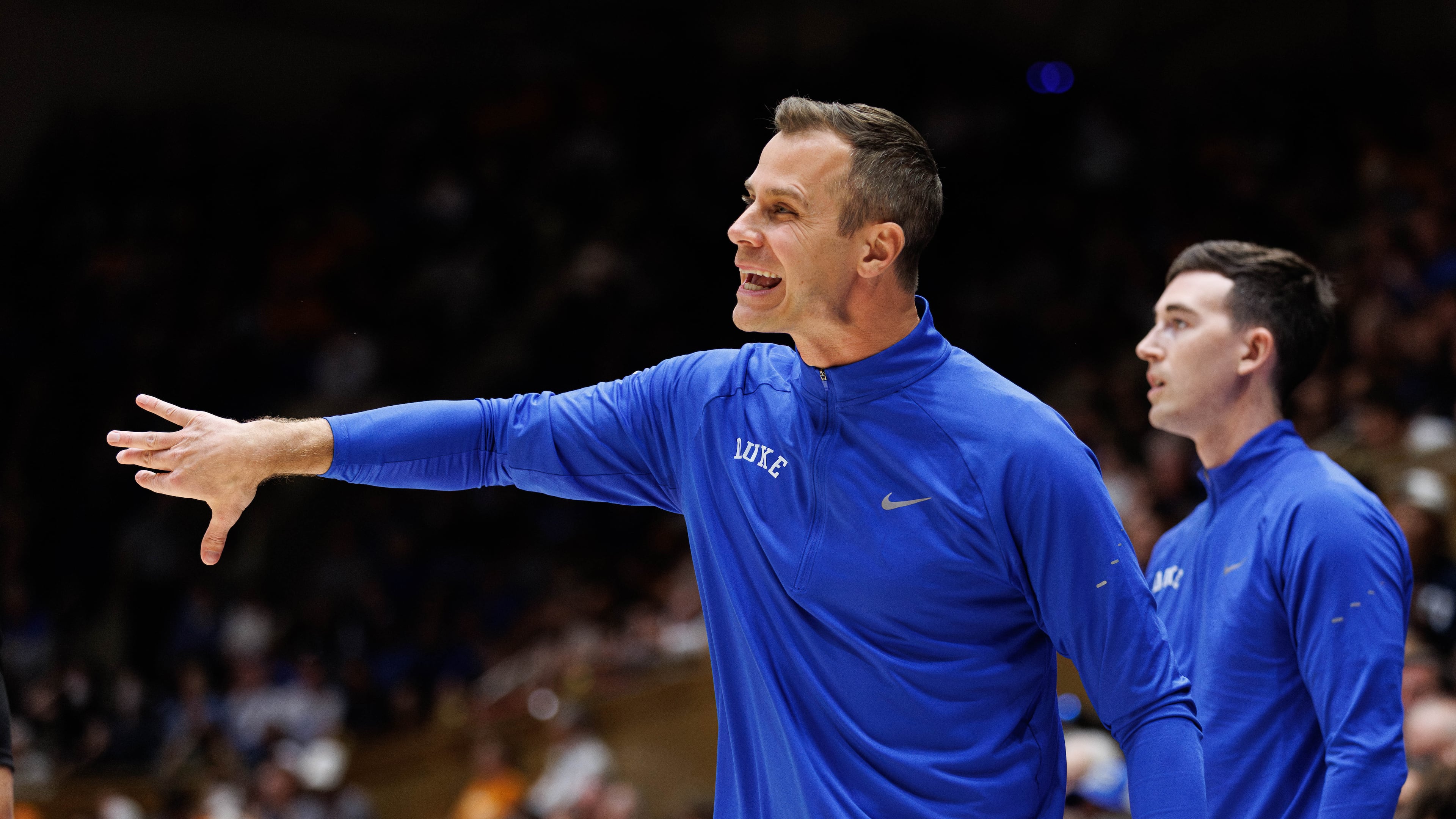 Duke head coach Jon Scheyer directs his team during the first half of an NCAA college basketball game against Tennessee in Durham, N.C., Tuesday, Oct. 20, 2026. (AP Photo/Ben McKeown)