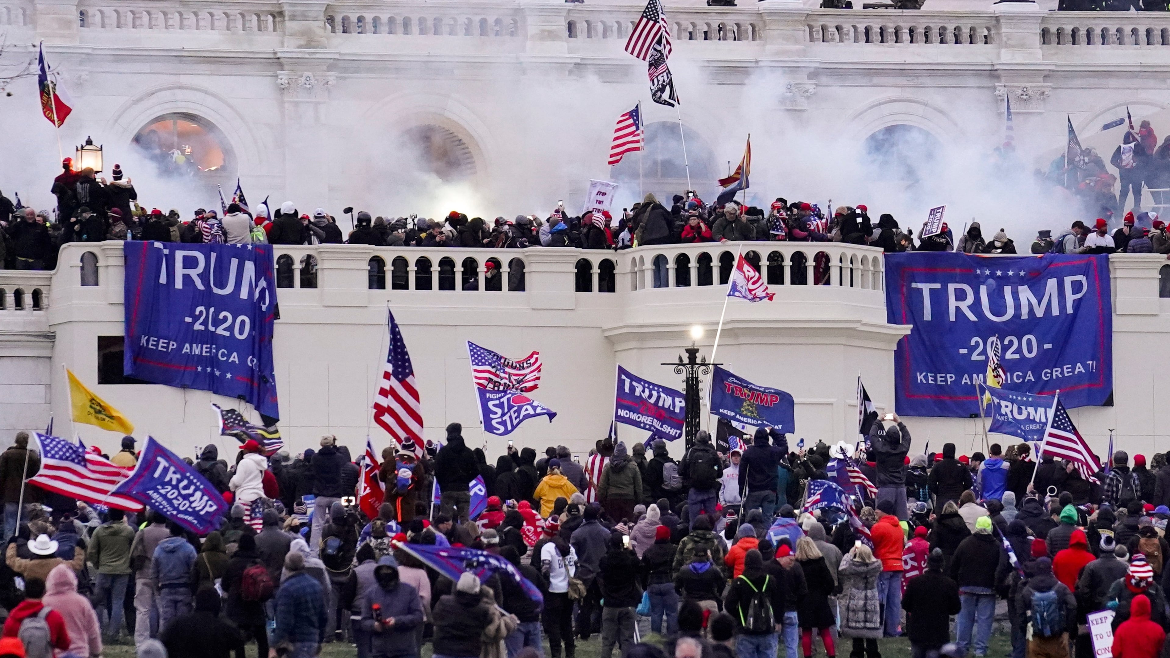 FILE - Rioters supporting President Donald Trump storm the Capitol in Washington, Jan. 6, 2021. (AP Photo/John Minchillo, File)
