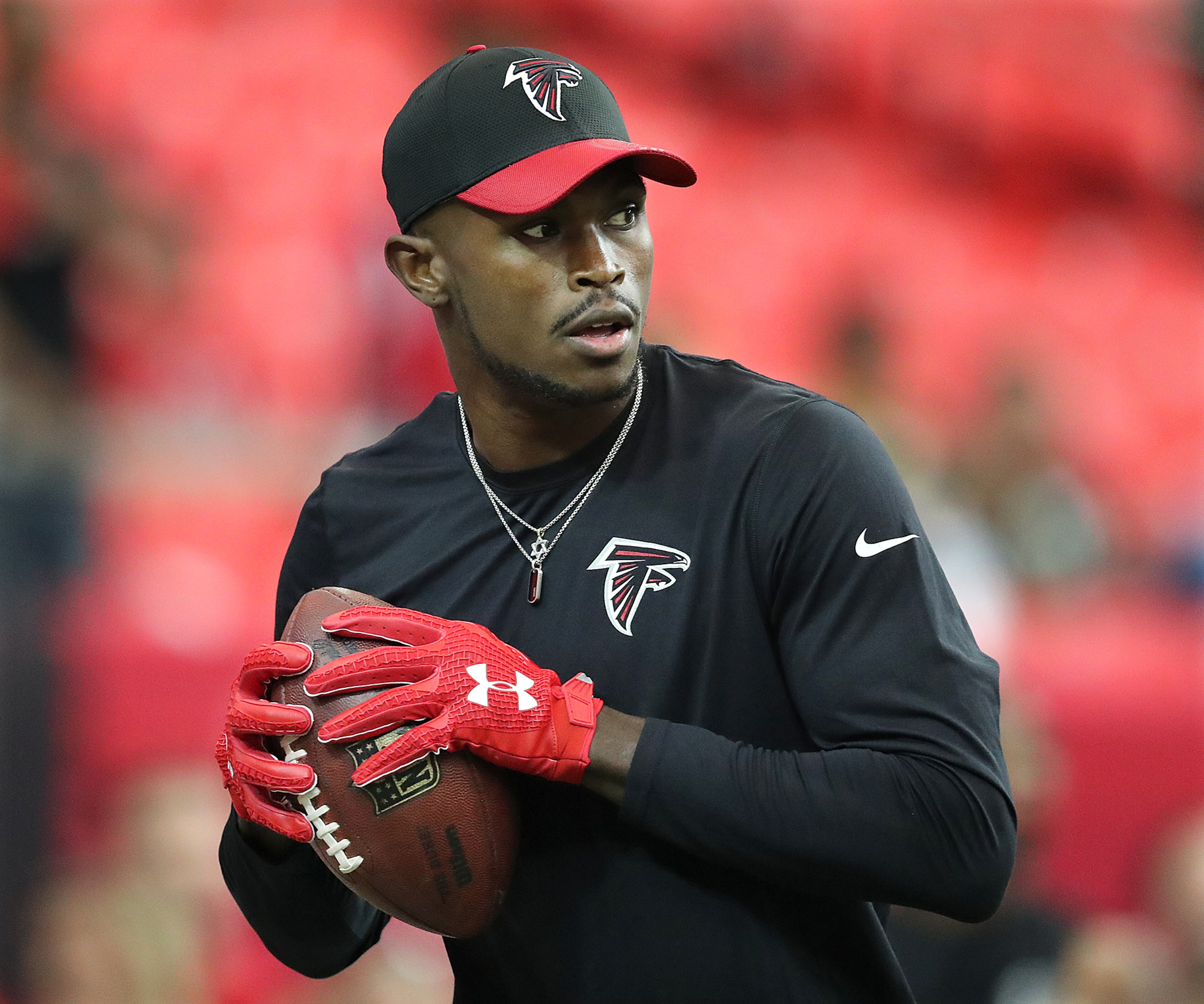 Falcons wide receiver Julio Jones catches a long pass from Matt Ryan as they prepare to play the Packers in an NFL football game on Sunday, Oct. 30, 2016, in Atlanta. Curtis Compton /ccompton@ajc.com