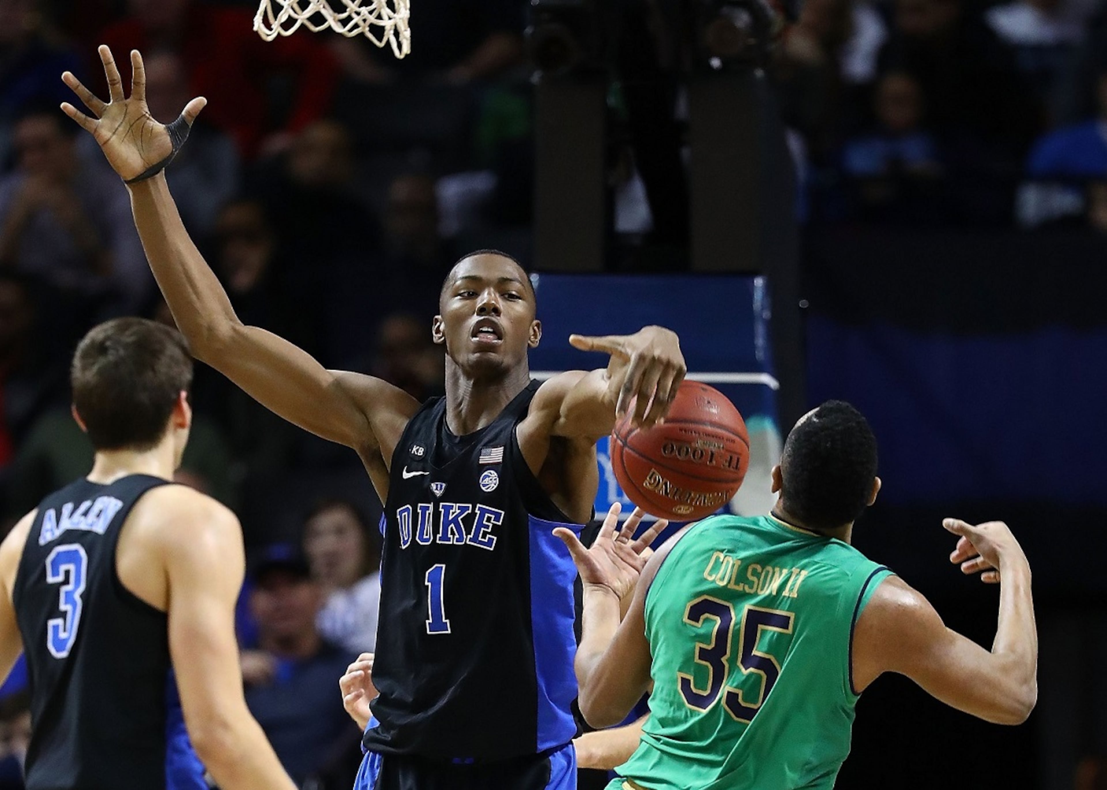 NEW YORK, NY - MARCH 11: Harry Giles #1 of the Duke Blue Devils blocks a shot by Bonzie Colson #35 of the Notre Dame Fighting Irish during the championship game of the 2017 Men's ACC Basketball Tournament at the Barclays Center on March 11, 2017 in New York City. (Photo by Al Bello/Getty Images)