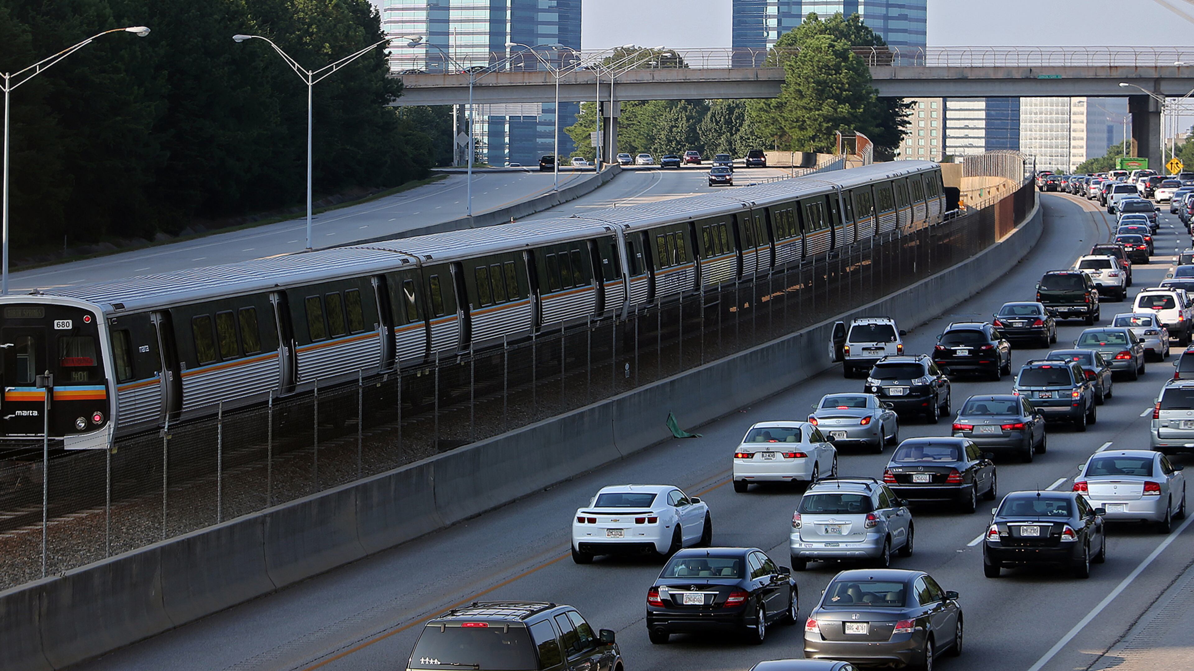 A MARTA train makes its way North past Ga. 400 traffic.