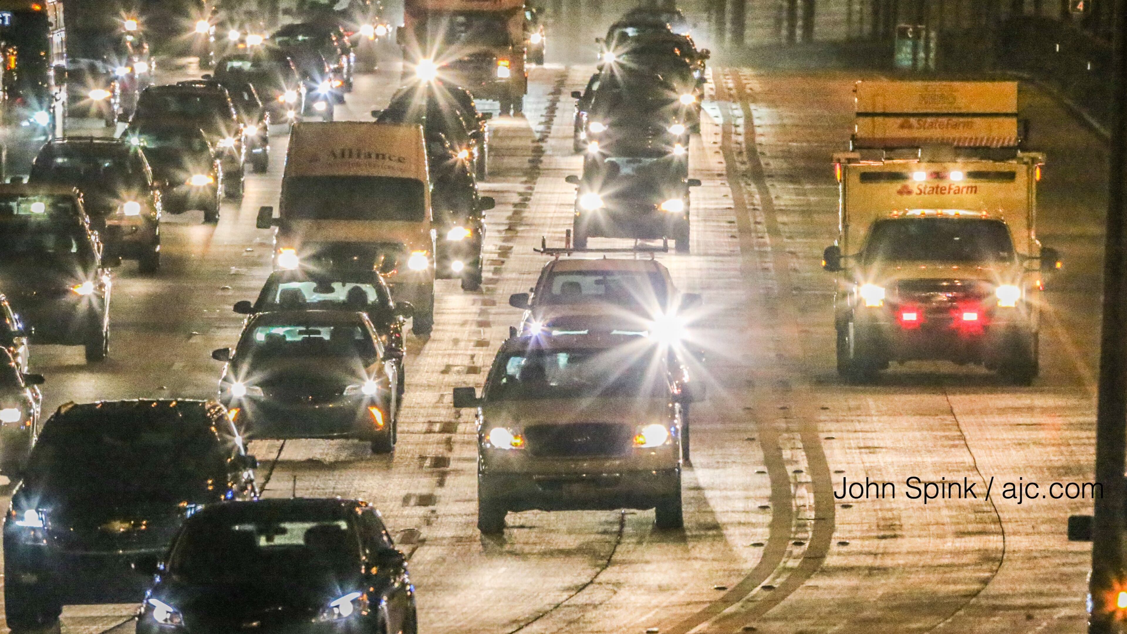 All westbound lanes on I-20 reopened ahead of schedule early Tuesday. Part of the interstate buckled Monday. JOHN SPINK / JSPINK@AJC.COM