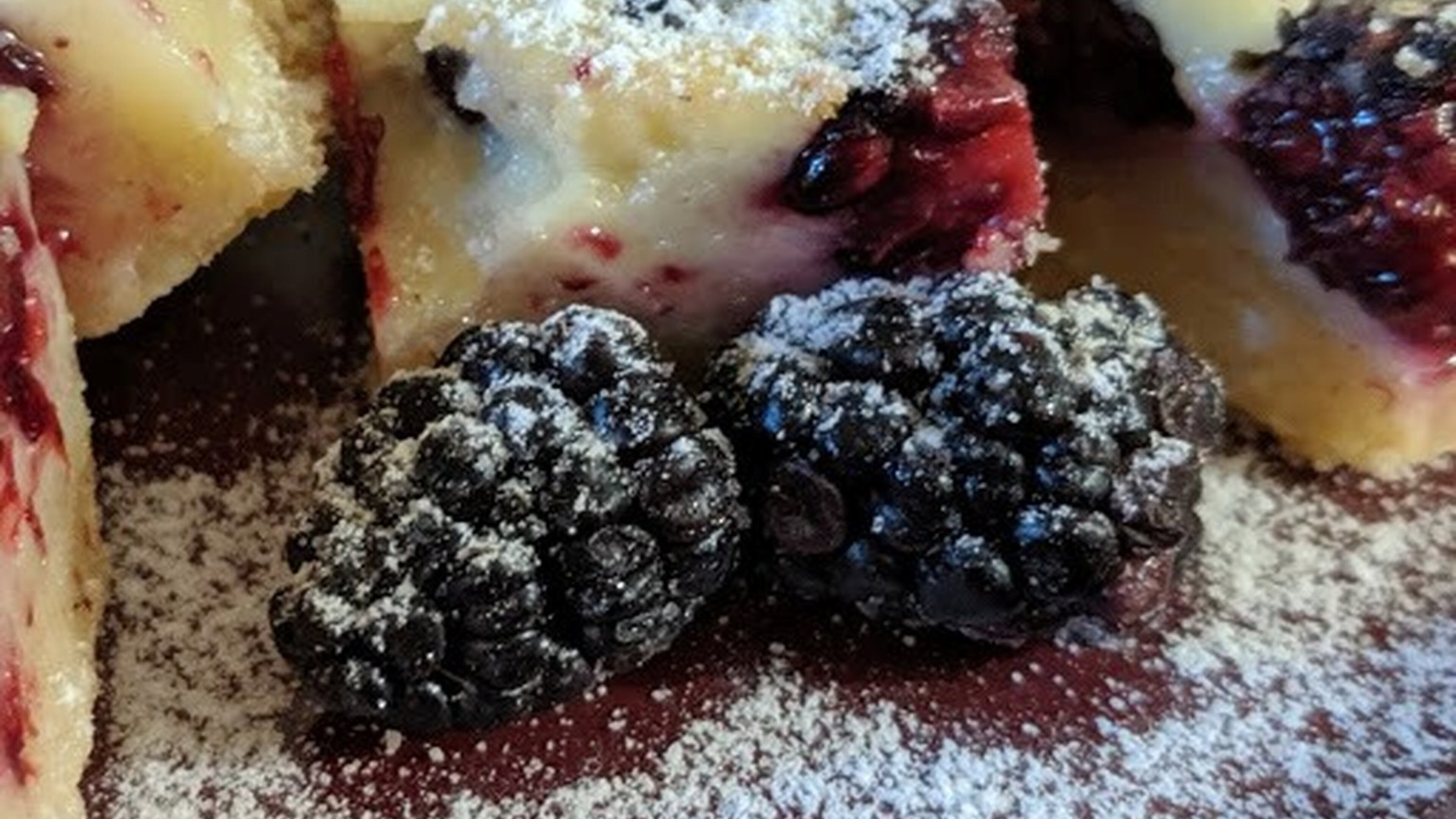 With Blackberry Custard Bars, one of the recipes in “Decadent Fruit Desserts” by Jackie Bruchez, the blackberries take center stage. PHOTO AND STYLING BY PAULA PONTES