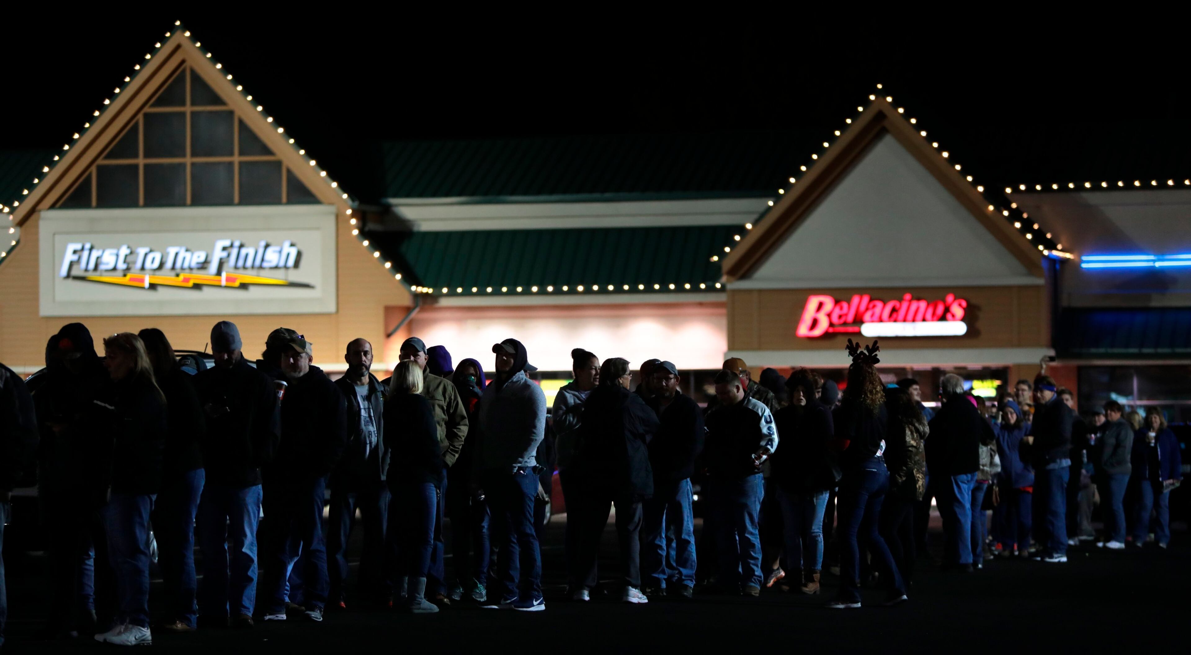 Lines wrap around Bass Pro Shops in St. Charles, Mo., before the 5 a.m. opening for Black Friday shopping on Friday, Nov. 23, 2018. (Robert Cohen/St. Louis Post-Dispatch via AP)