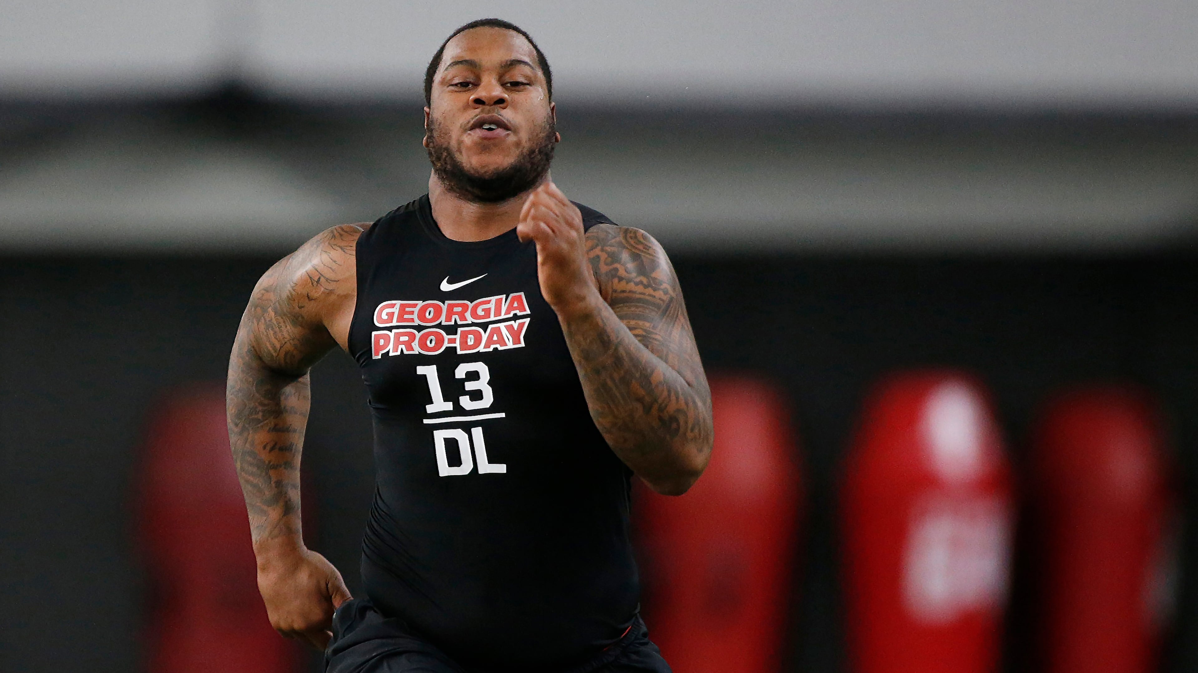 Georgia defensive end Jonathan Ledbetter runs the 40-yard dash during Pro Day at the University of Georgia, Wednesday, March 20, 2019, in Athens.