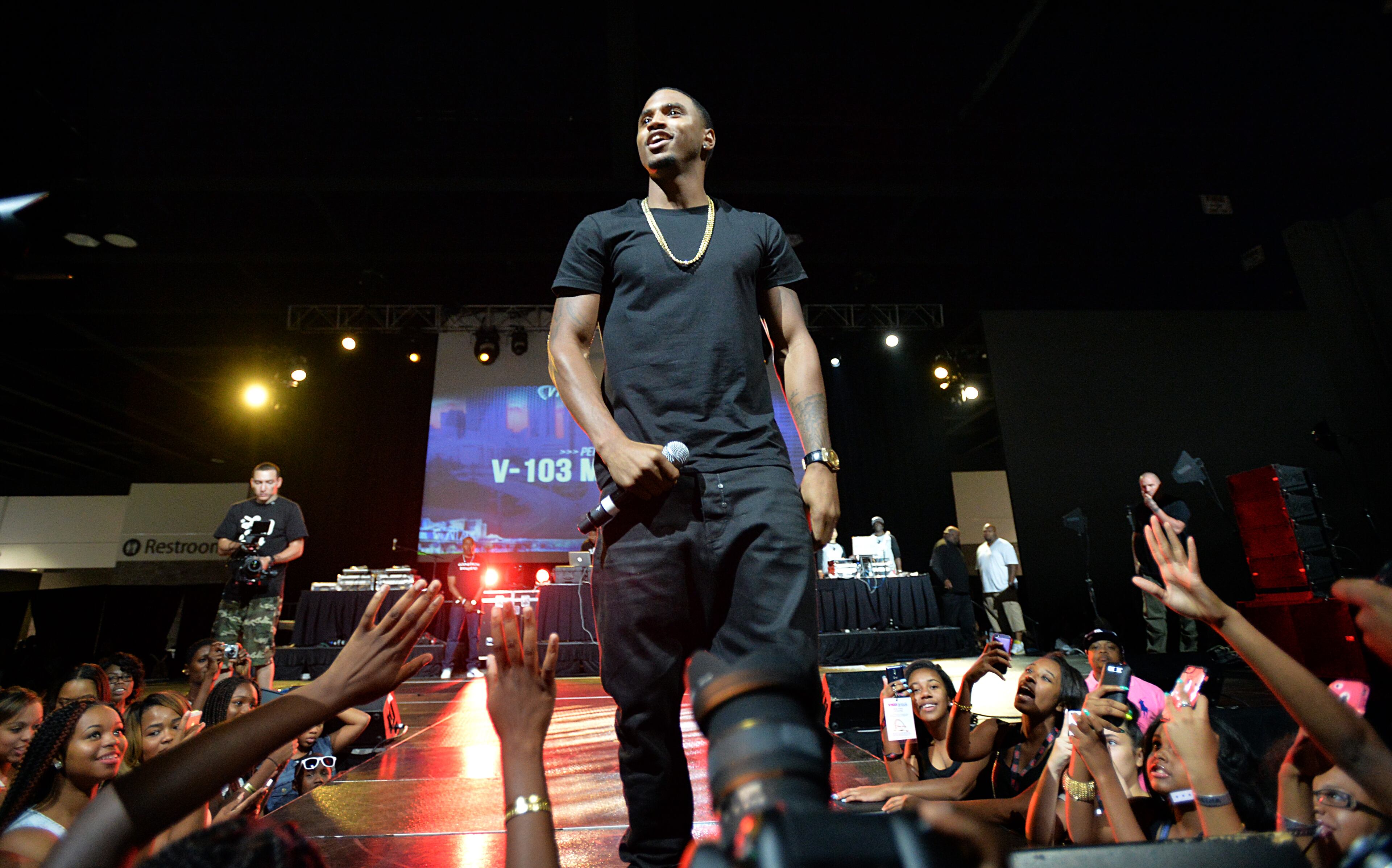 Trey Songz performs during The 2014 V-103/WAOK Car & Bike Show at the Georgia World Congress Center on Saturday, July 12, 2014.