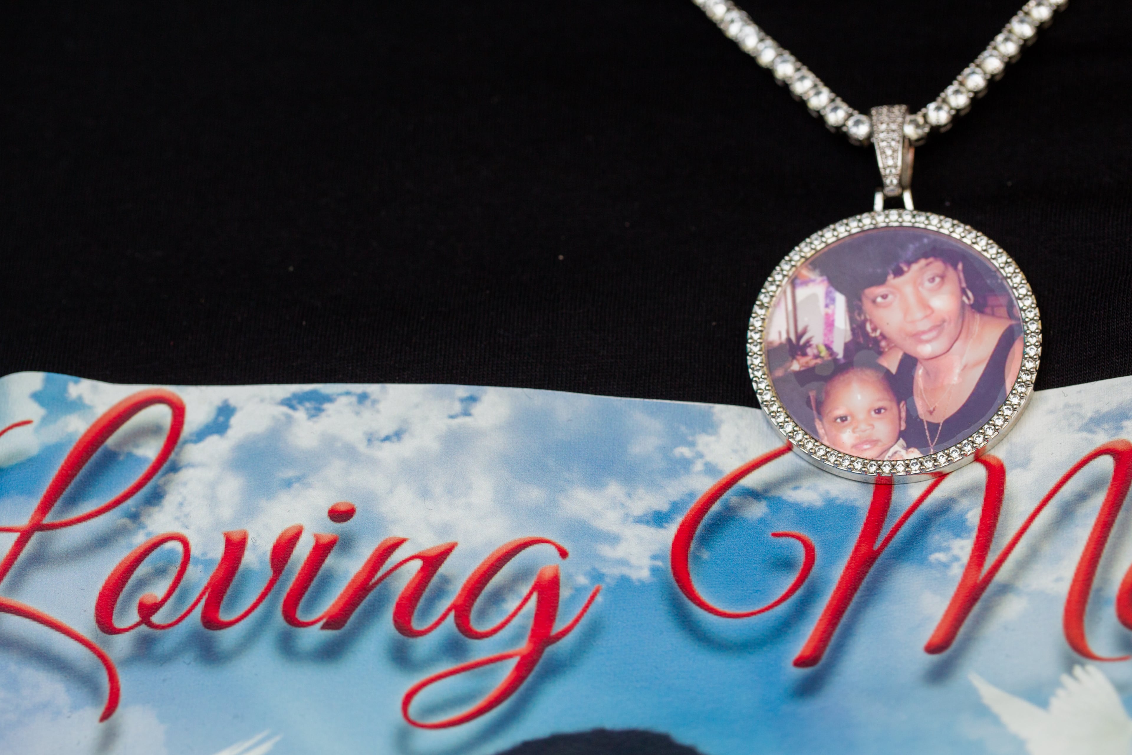 Family and friends of Normisha “MiMi” Monroe gather Saturday, May 1, 2021, at Club Drive Park in Lawrenceville to celebrate the life of the 38-year-old, who died along with five other women in a passenger van crash on I-85 a week earlier. Many custom T-shirts were handed out and worn; some family members had a photo of Mimi and her mother, who passed away years ago. (Photo: Jenni Girtman for The Atlanta Journal-Constitution)