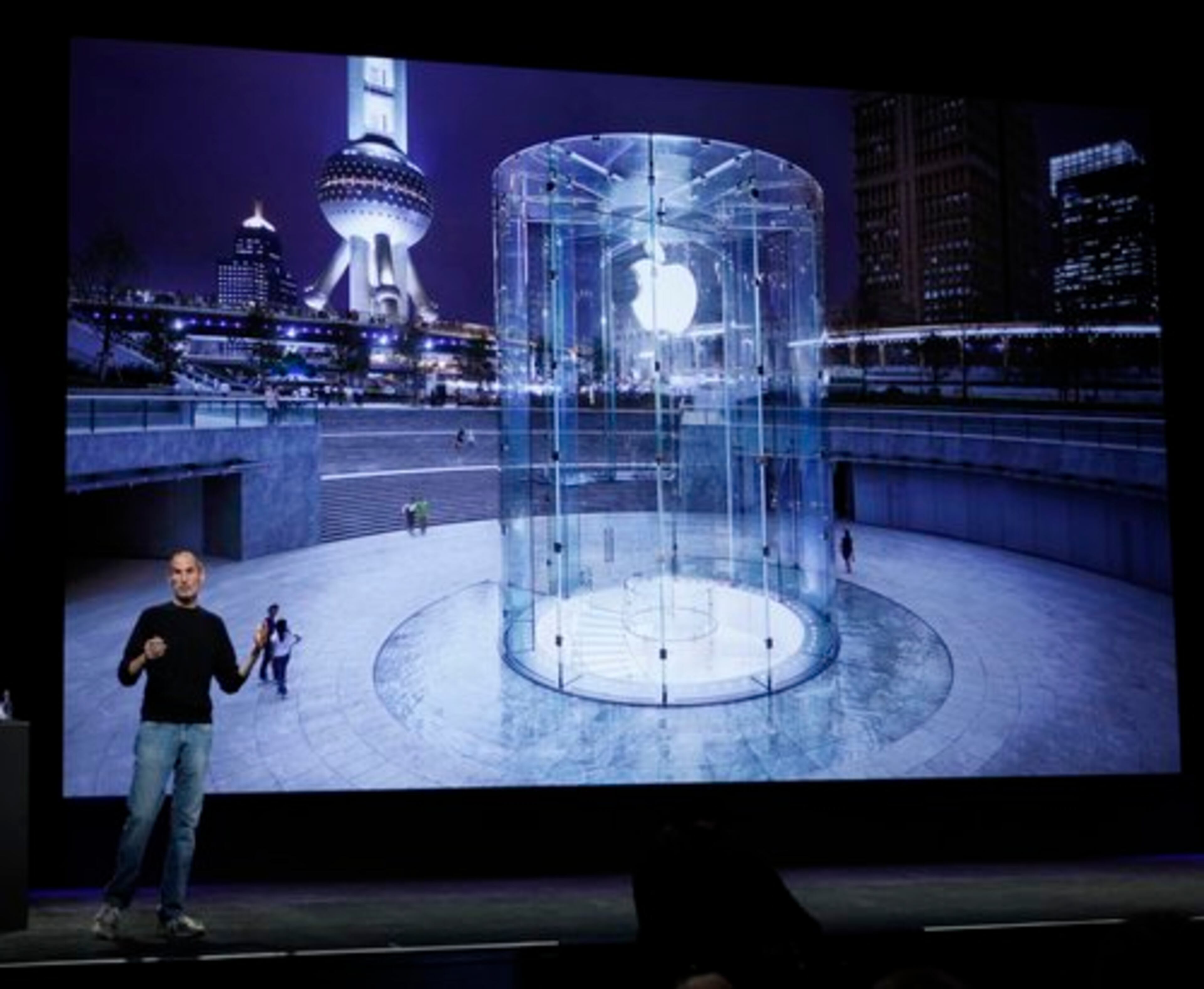 At the news conference, Jobs shows an image of Apple's store in Shanghai.