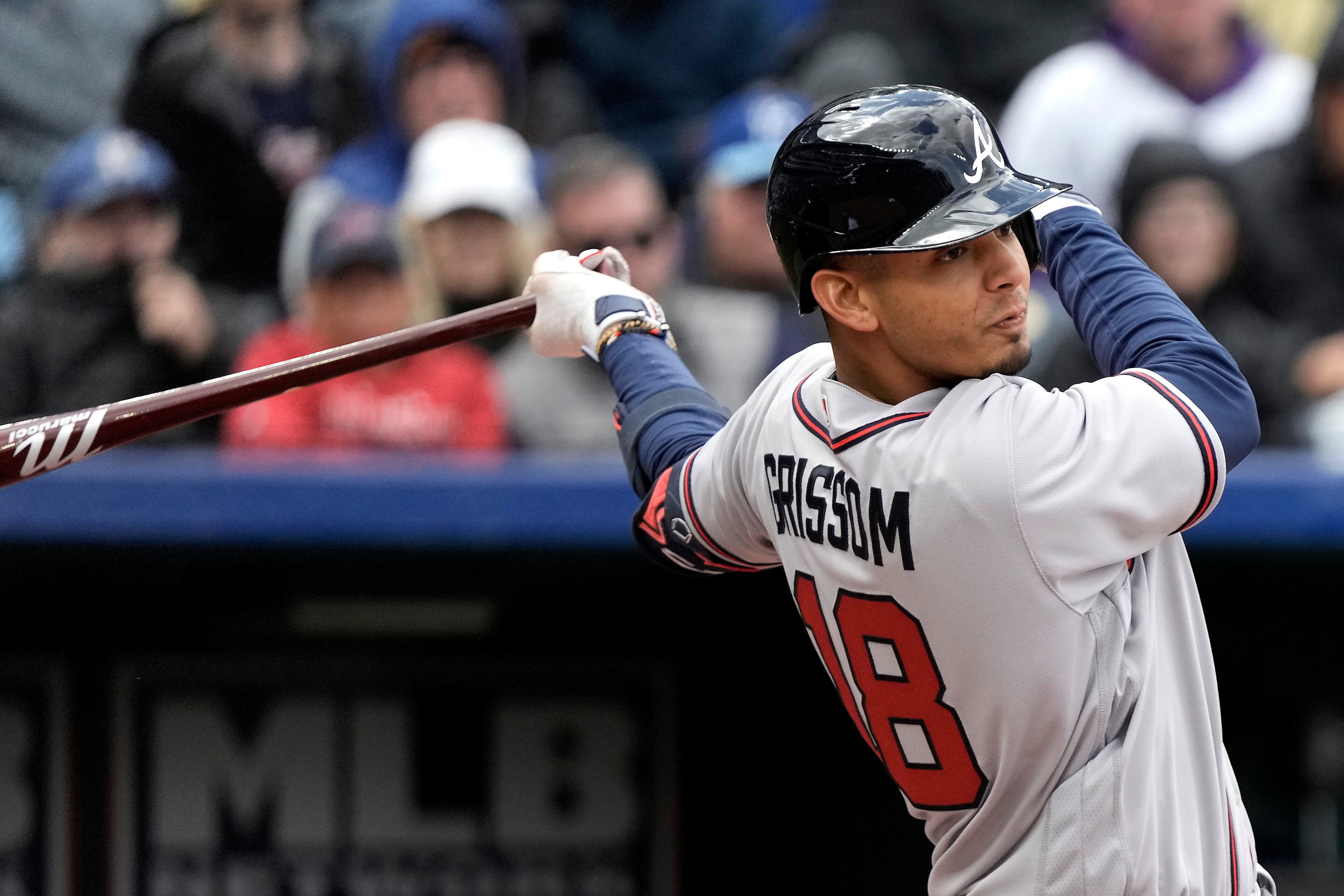 Vaughn Grissom follows through on his RBI single in the ninth inning of Sunday's 5-4 victory over the Royals. (AP Photo/Charlie Riedel)