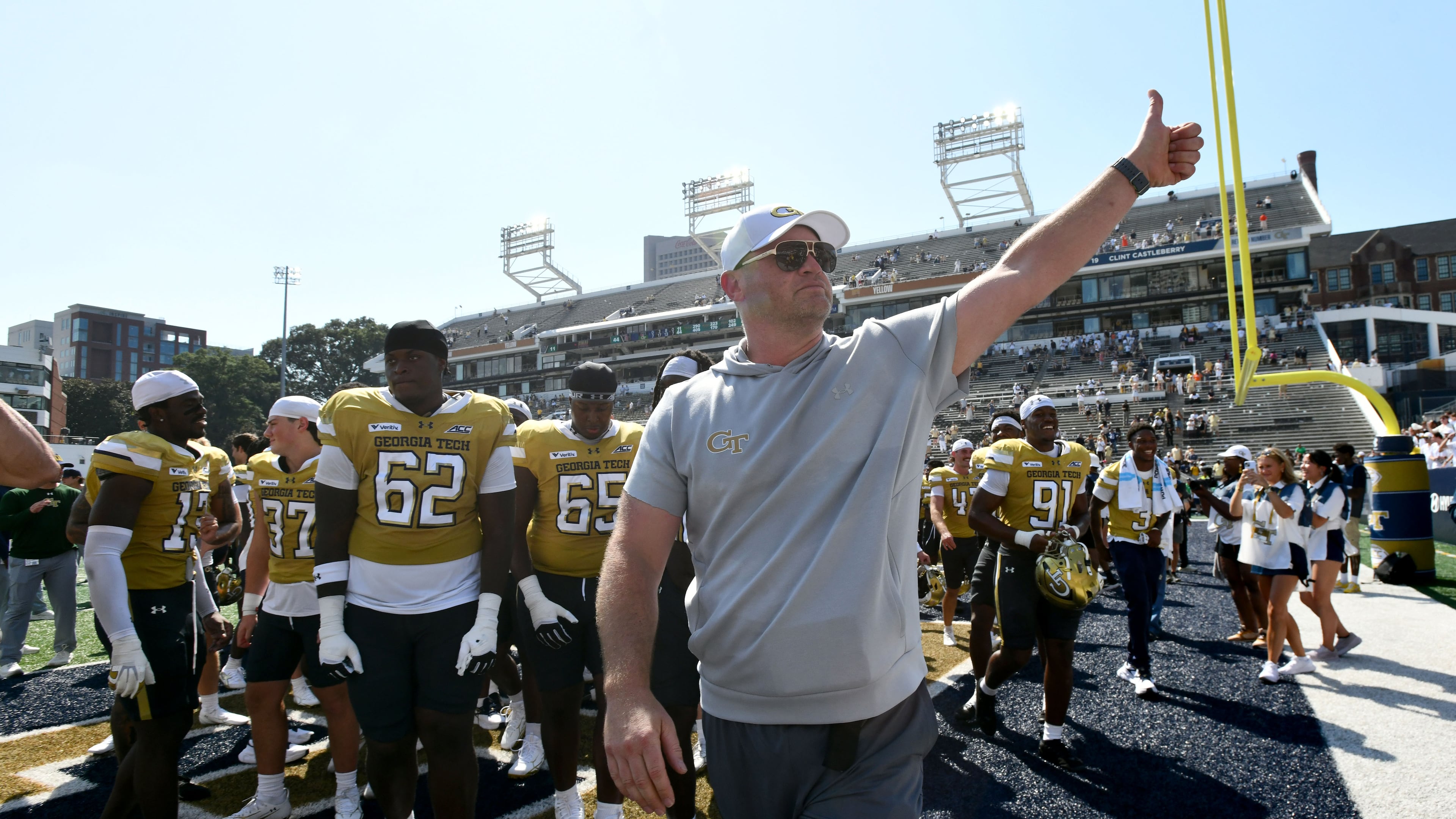 Georgia Tech head coach Brent Key and players celebrate after Tech defeats Mercer at Bobby Dodd Stadium on Saturday, Sept. 19, 2026, in Atlanta. (Hyosub Shin/AJC)