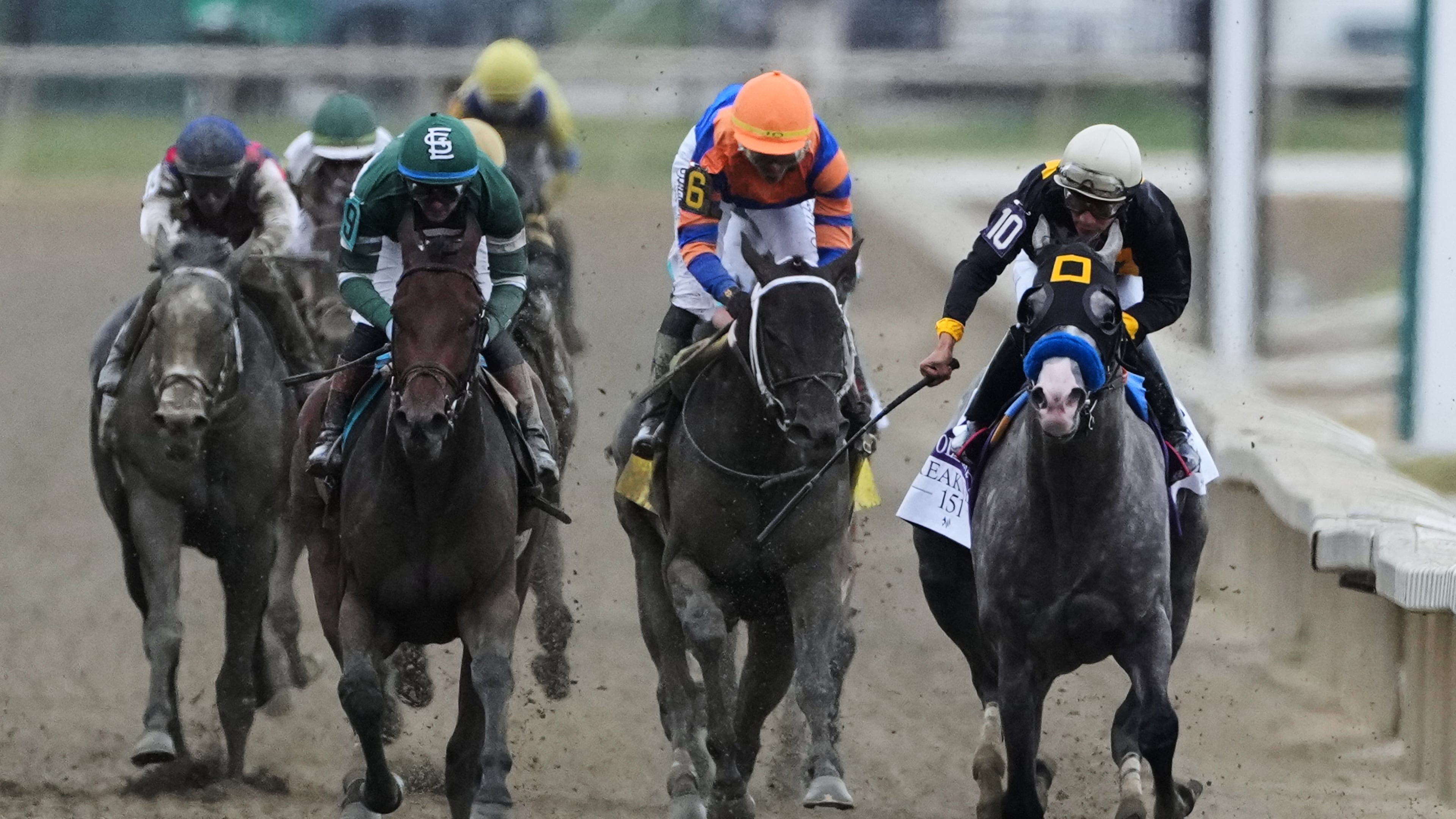 Paco Lopez, right, atop Napoleon Solo, leads the pack to win the 151st running of the Preakness Stakes horse race, Saturday, May 16, 2026, at Laurel Park in Laurel, Md. (AP Photo/Nick Wass)