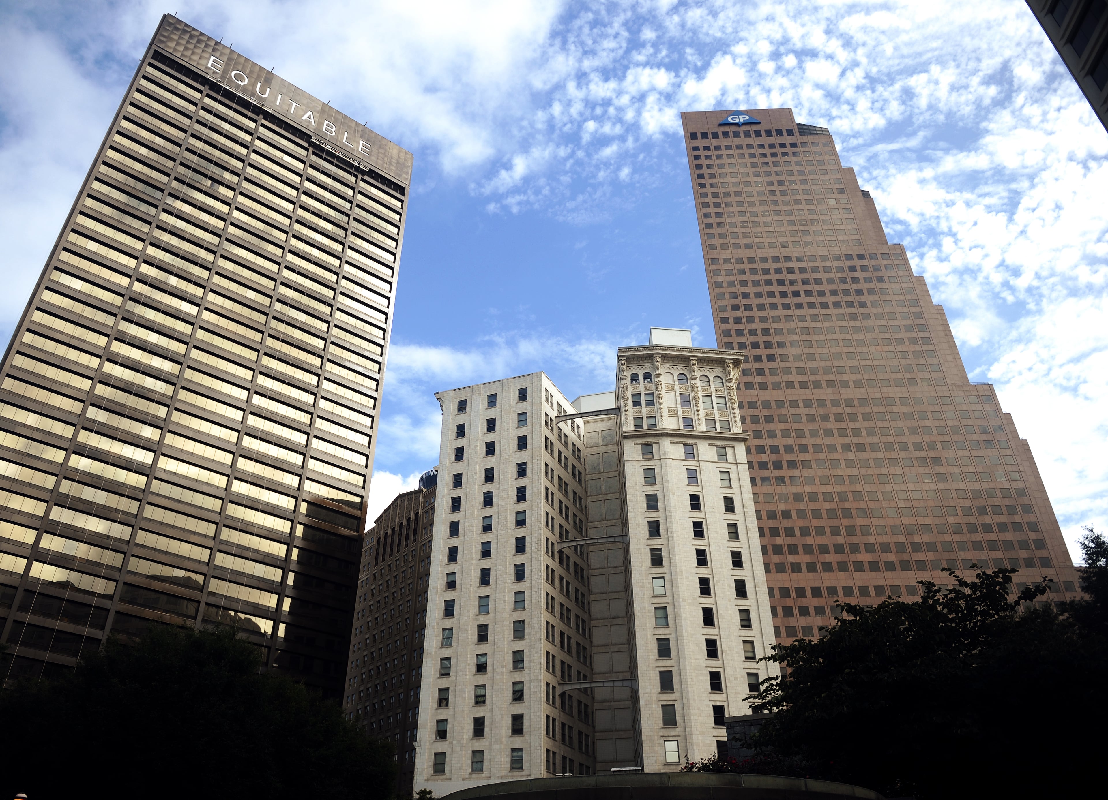 Today, the Candler Building (center, shortest building), is flanked by the Equitable (left) and Georgia-Pacific (right) buildings in downtown Atlanta.