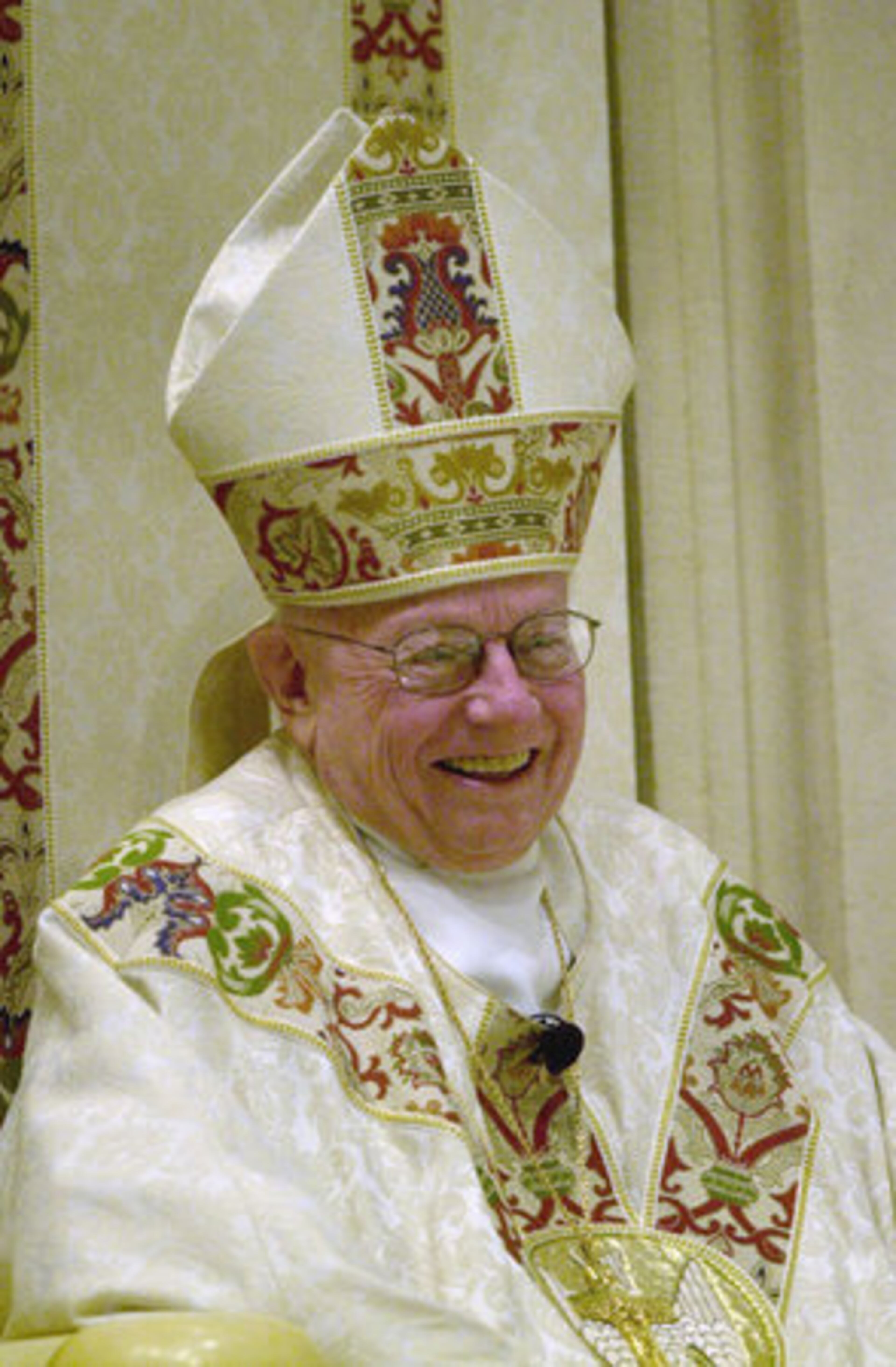 In this Jan. 10, 2005 photo, Archbishop John Francis Donoghue laughs as Monseignor R. Donald Kiernan tells funny stories from Donoghue's tenure during a mass in his honor on the occasion of his retirement.