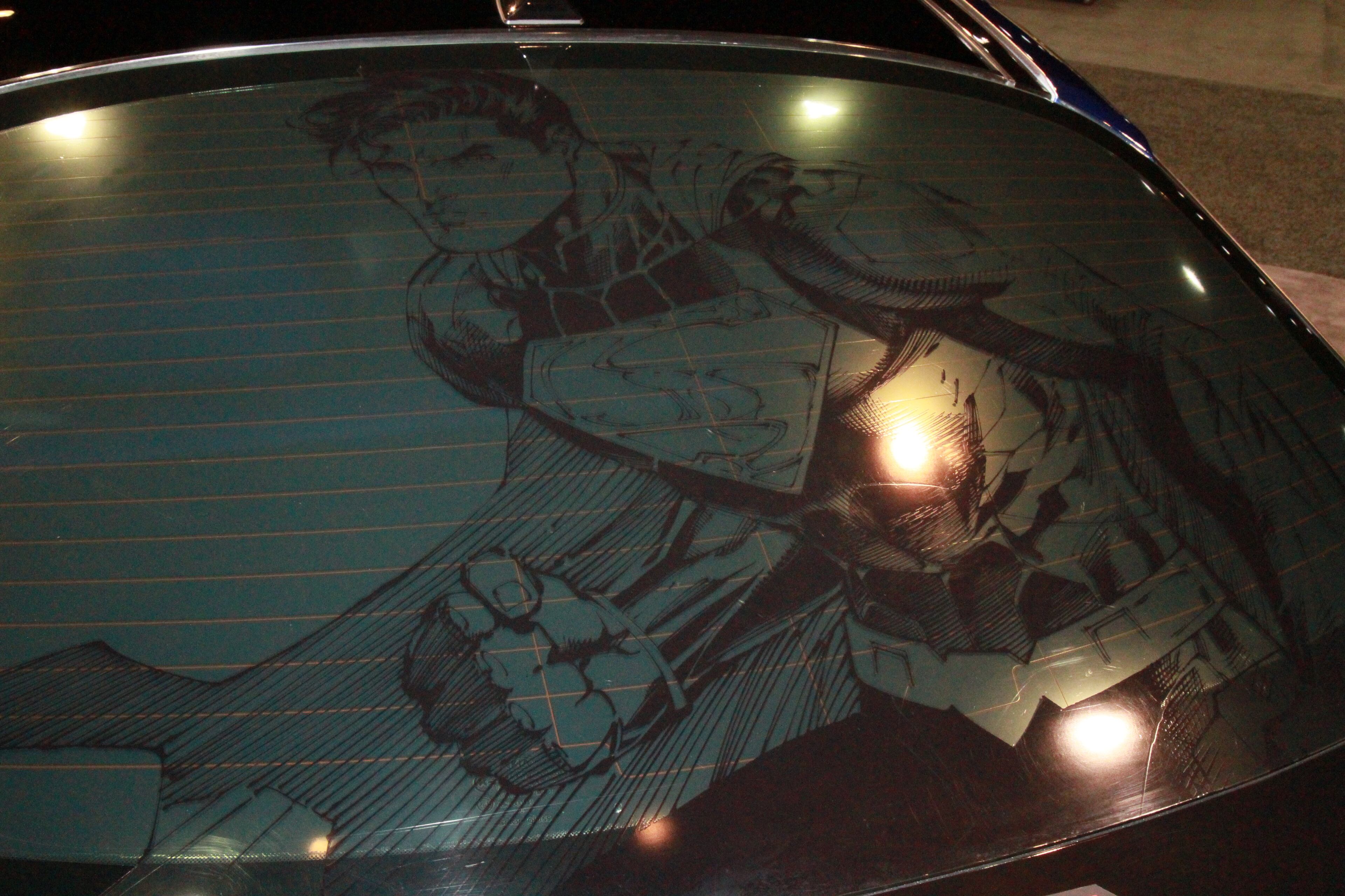 This is one of the Justice League of America themed cars. Kia teamed up with DC Entertainment to produce a series of custom vehicles.