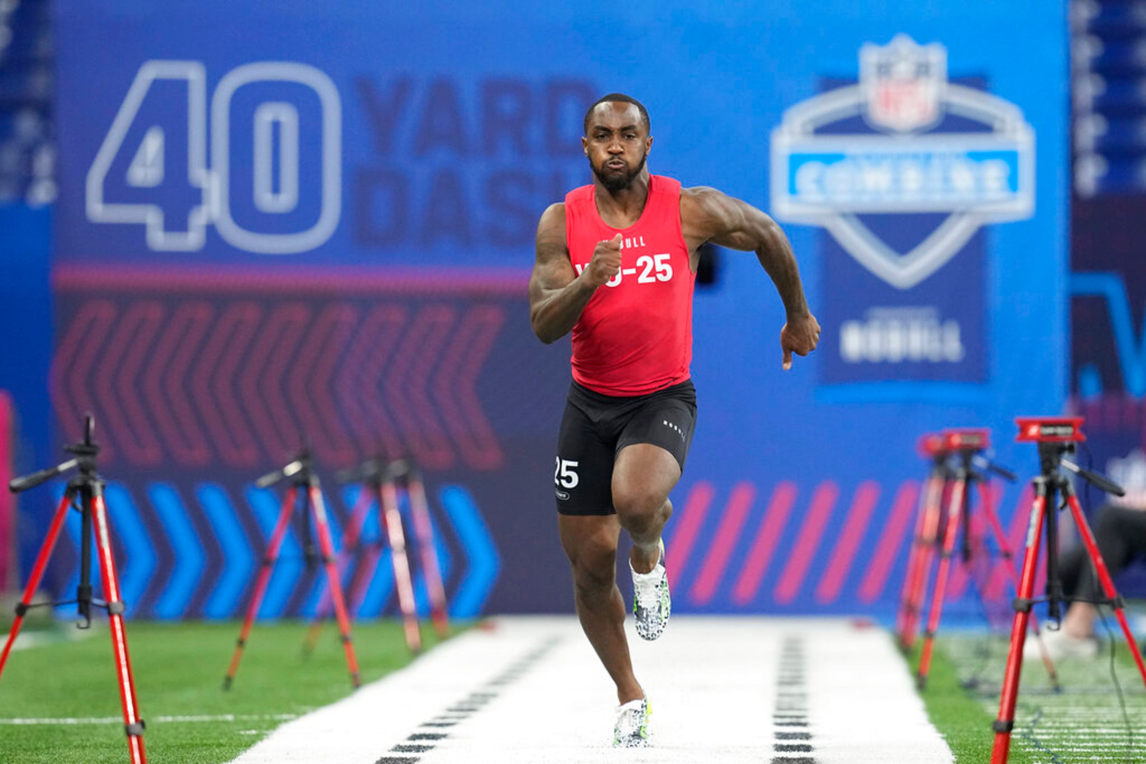 Georgia wide receiver Kearis Jackson runs the 40-yard dash at the NFL football scouting combine in Indianapolis, Saturday, March 4, 2023. (AP Photo/Darron Cummings)