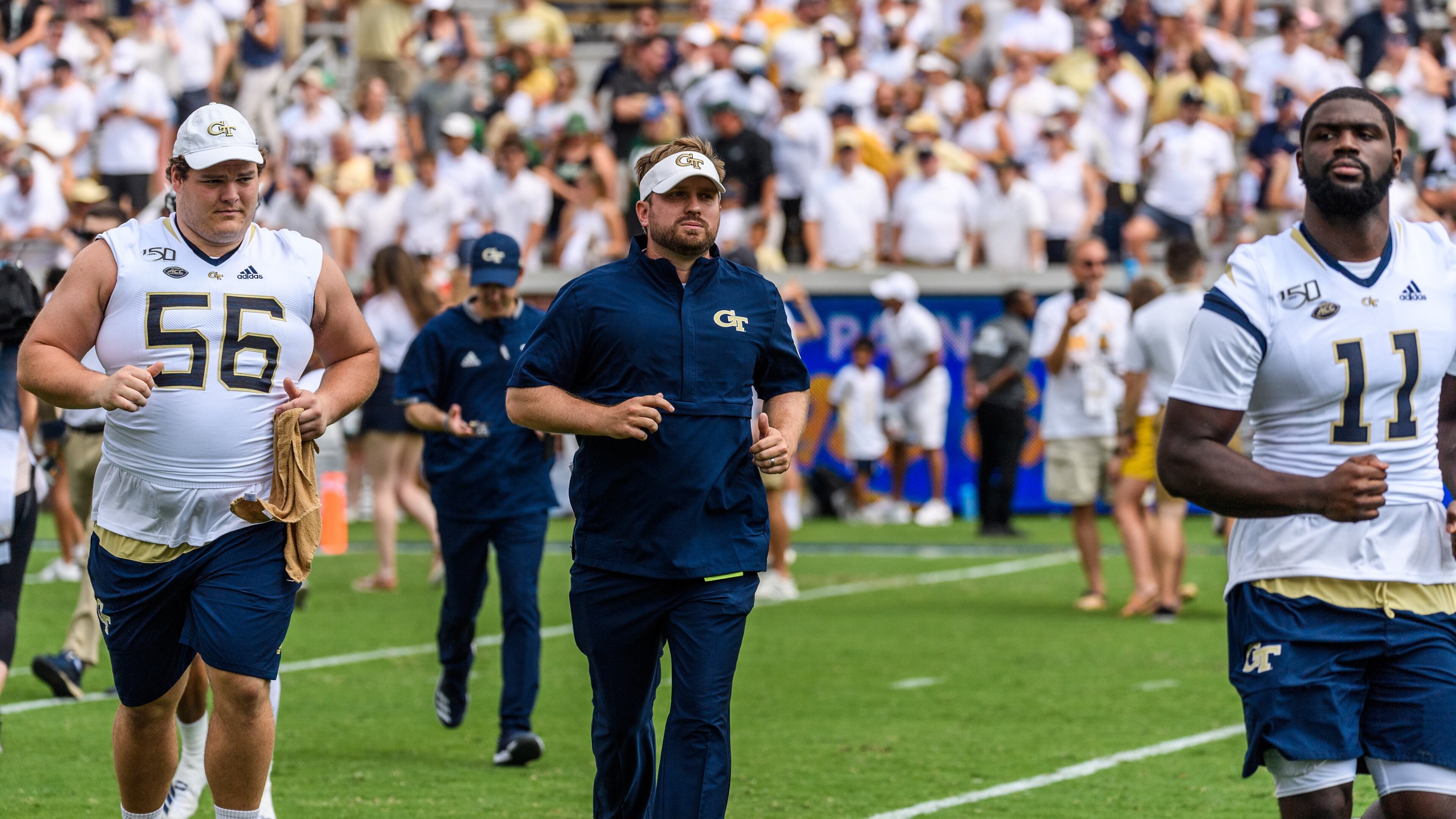 Georgia Tech general manager Patrick Suddes (middle) was hired to lead recruiting efforts for coach Geoff Collins in January 2019. (Danny Karnik/Georgia Tech Athletics)