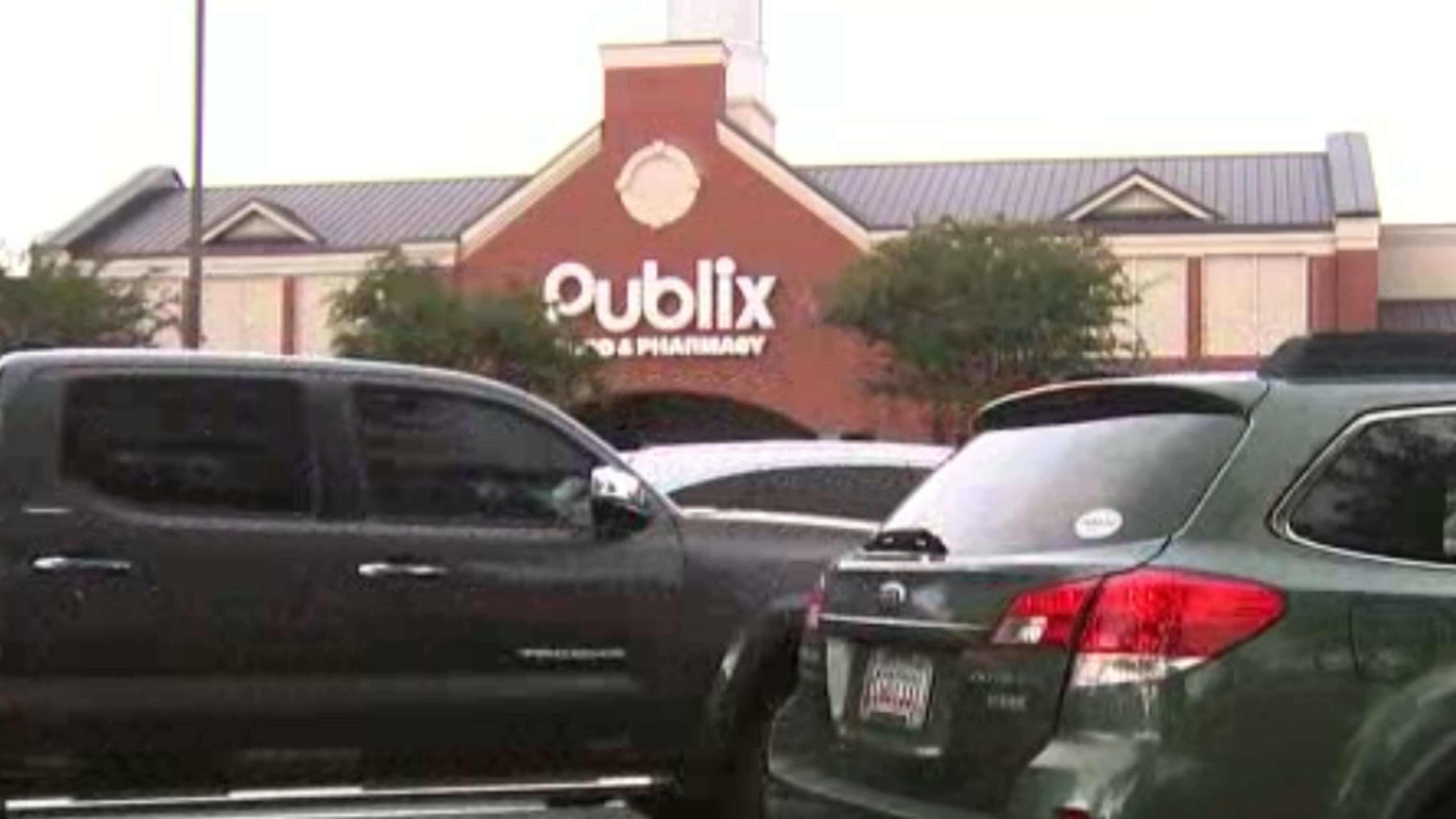 A grocery store manager said two men stole his pickup truck at gunpoint in Roswell.