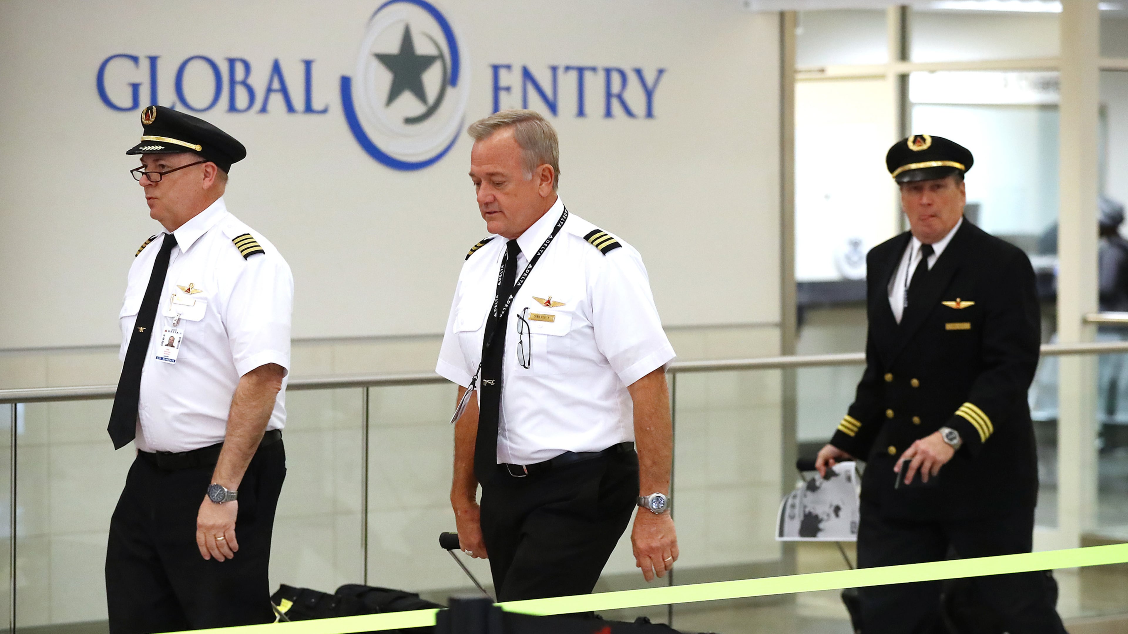 In this file photo, Delta pilots arrive from Stuttgart in the International Terminal at Hartsfield-Jackson International Airport on Monday, March 16, 2020, in Atlanta. (Curtis Compton/Atlanta Journal-Constitution/TNS)