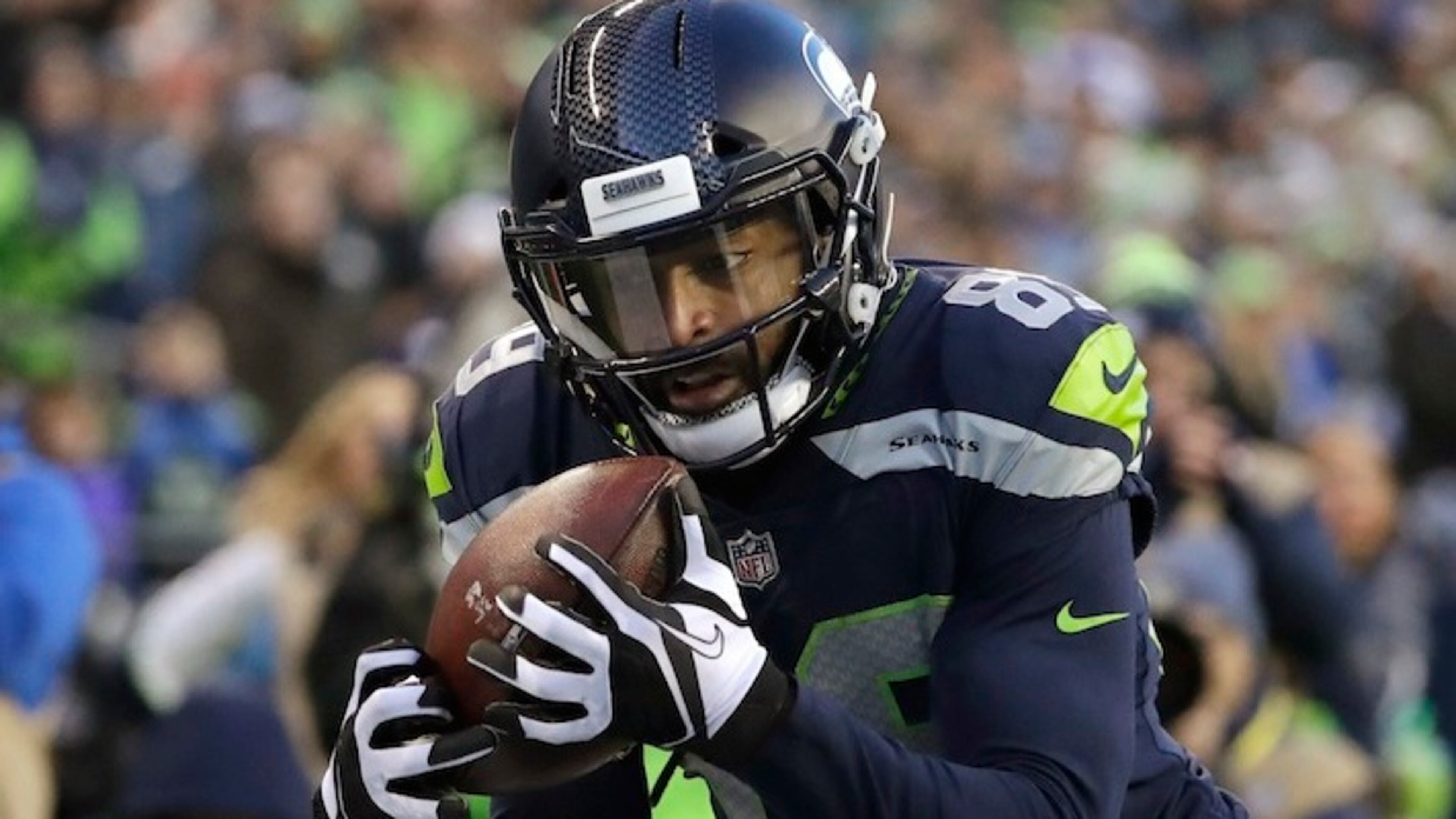 Seattle Seahawks wide receiver Doug Baldwin makes a catch for a touchdown against the Arizona Cardinals in the second half of an NFL football game, Sunday, Dec. 31, 2017, in Seattle. (AP Photo/Elaine Thompson)