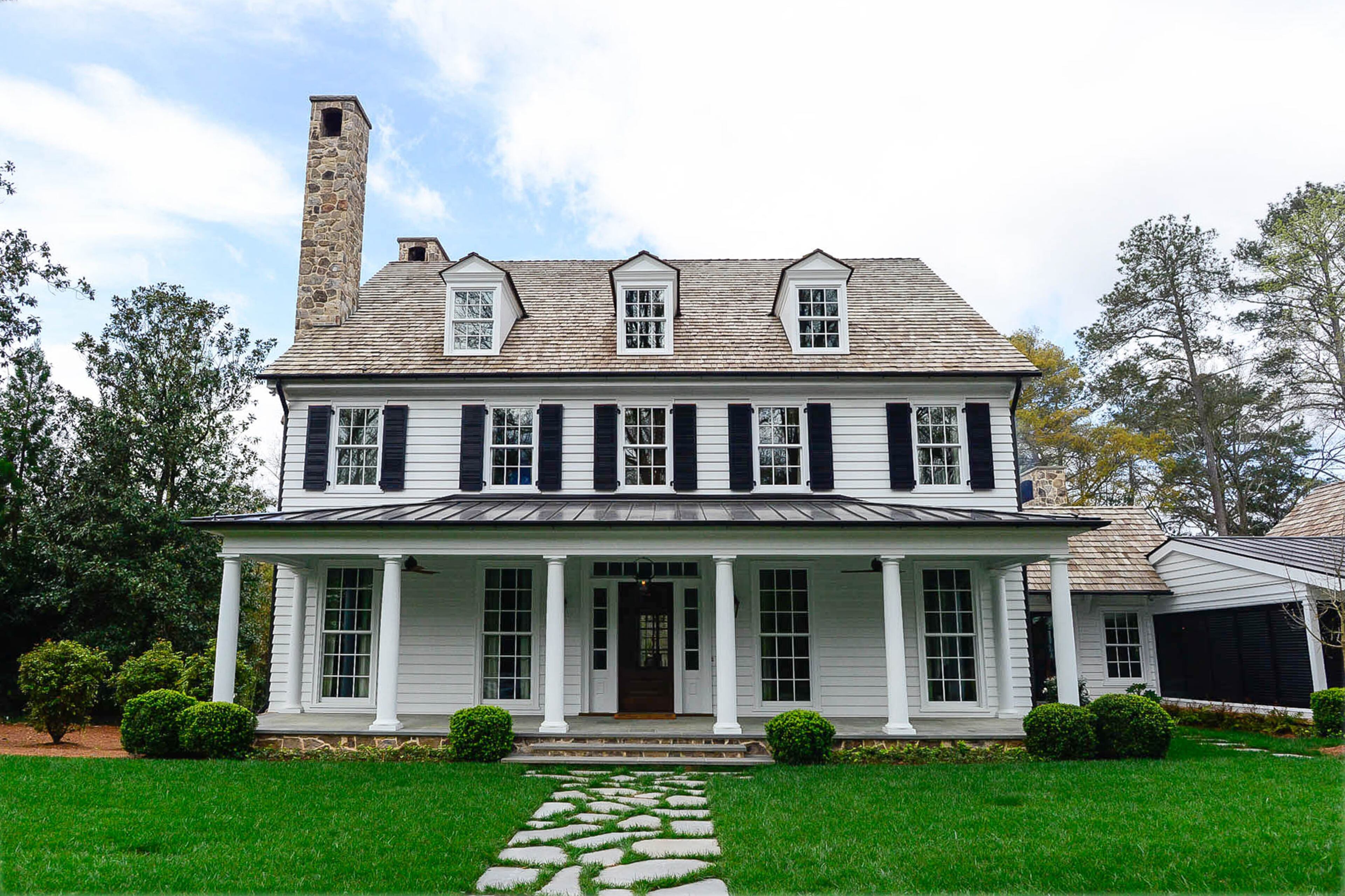 The Virginia farmhouse-style home, built in 2017, uses Tennessee fieldstone for the base and chimneys. The architect was Norman Davenport Askins and builder was Bonner Custom Homes. "When you get there, you feel like the house has been there for 100 years, and that was our goal," she said.