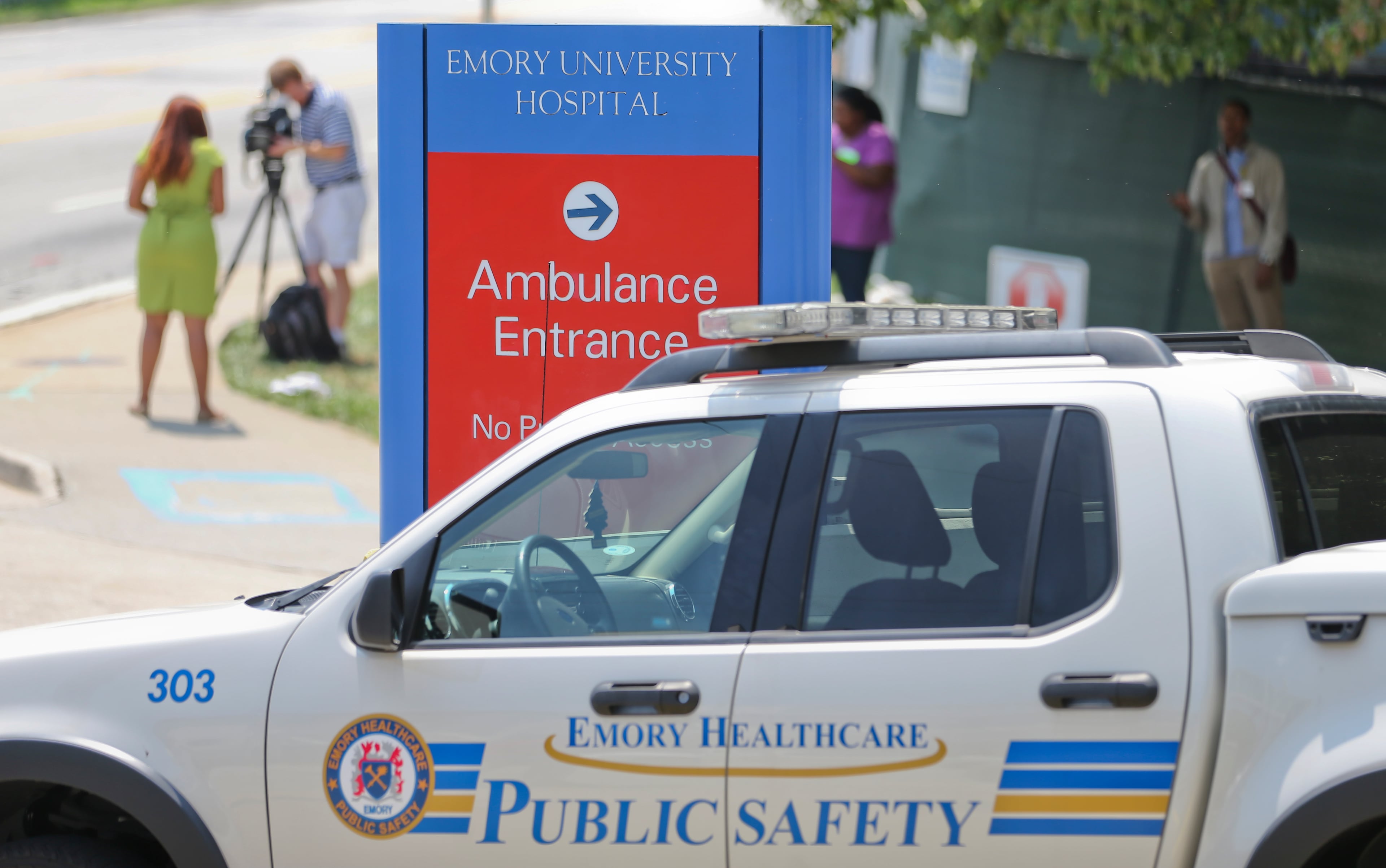 The Emory Hospital campus was business as usual as the second American aid worker infected with Ebola arrived at Emory Hospital Tuesday, Aug. 5, 2014 in Atlanta. Nancy Writebol arrived in a chartered jet at Dobbins Air Reserve Base and was then taken in an ambulance to Emory University Hospital. She was taken from the ambulance by gurney and rolled into the hospital by suited medical personnel. Three days earlier, Dr. Kent Brantly, also diagnosed with the virus, arrived at Emory walked from the ambulance. The two patients are being treated in an isolation unit. MANDATORY CREDIT / JOHN SPINK/JSPINK@AJC.COM