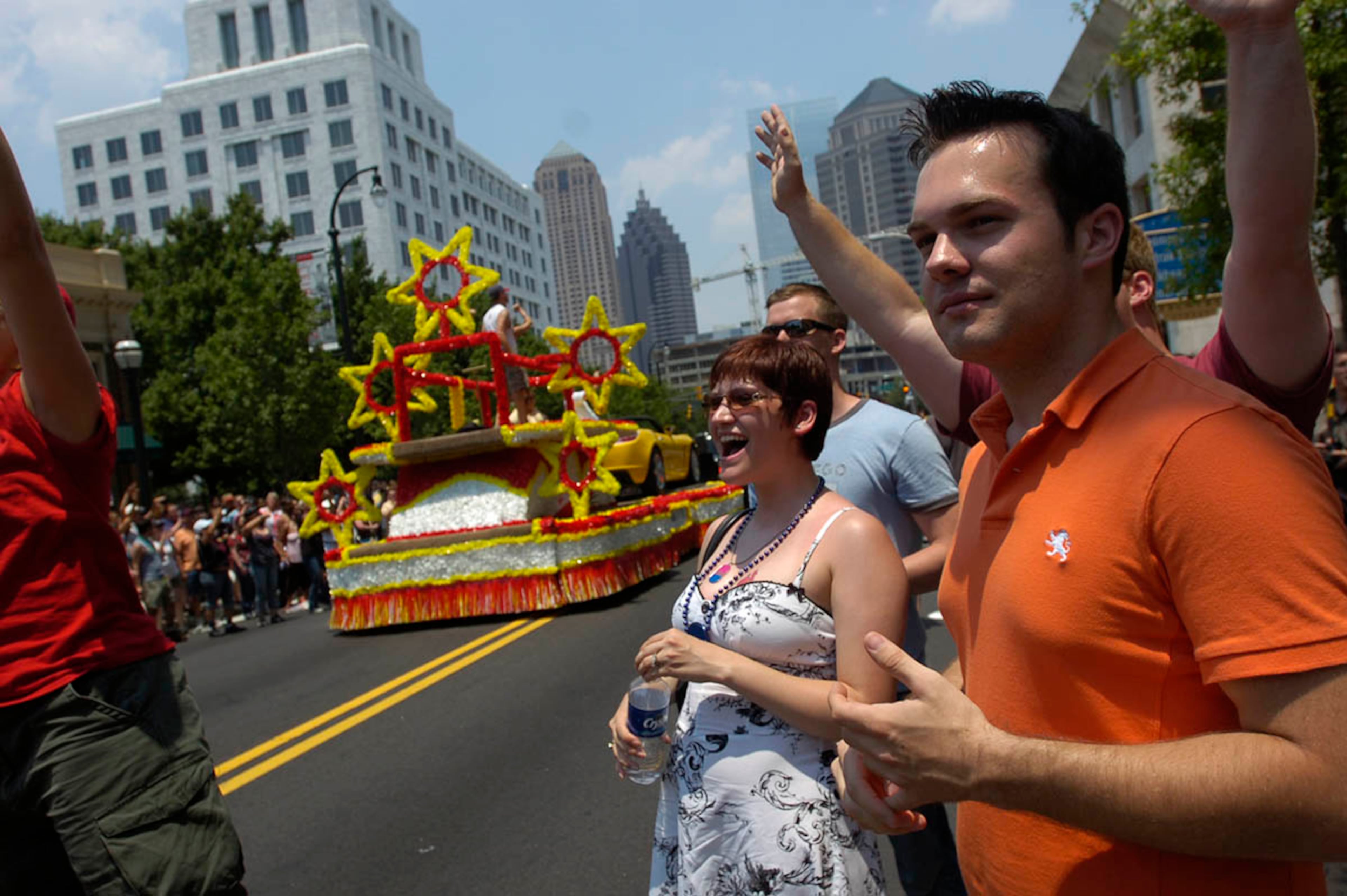 Stephen Benjamin, a former Arabic translator for the military who was discharged when the Navy found out he is gay, watches the 2007 Pride parade. The theme that year was "Our Rights, Your Rights, Human Rights". AJC / 2007