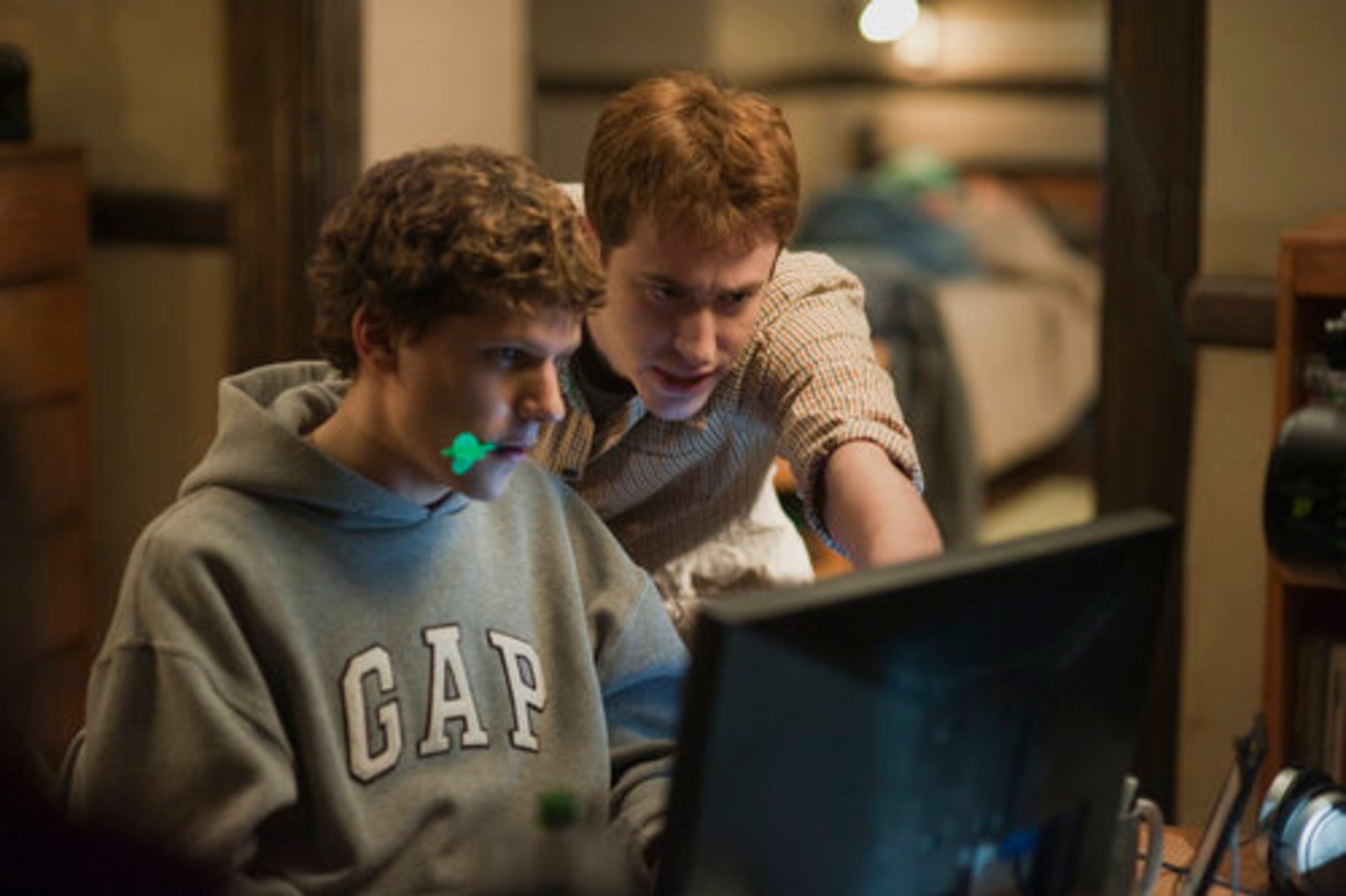 "The Social Network" tied for second with six nominations, including best drama, Jesse Eisenberg as best dramatic actor, Andrew Garfield as supporting actor and David Fincher as director.