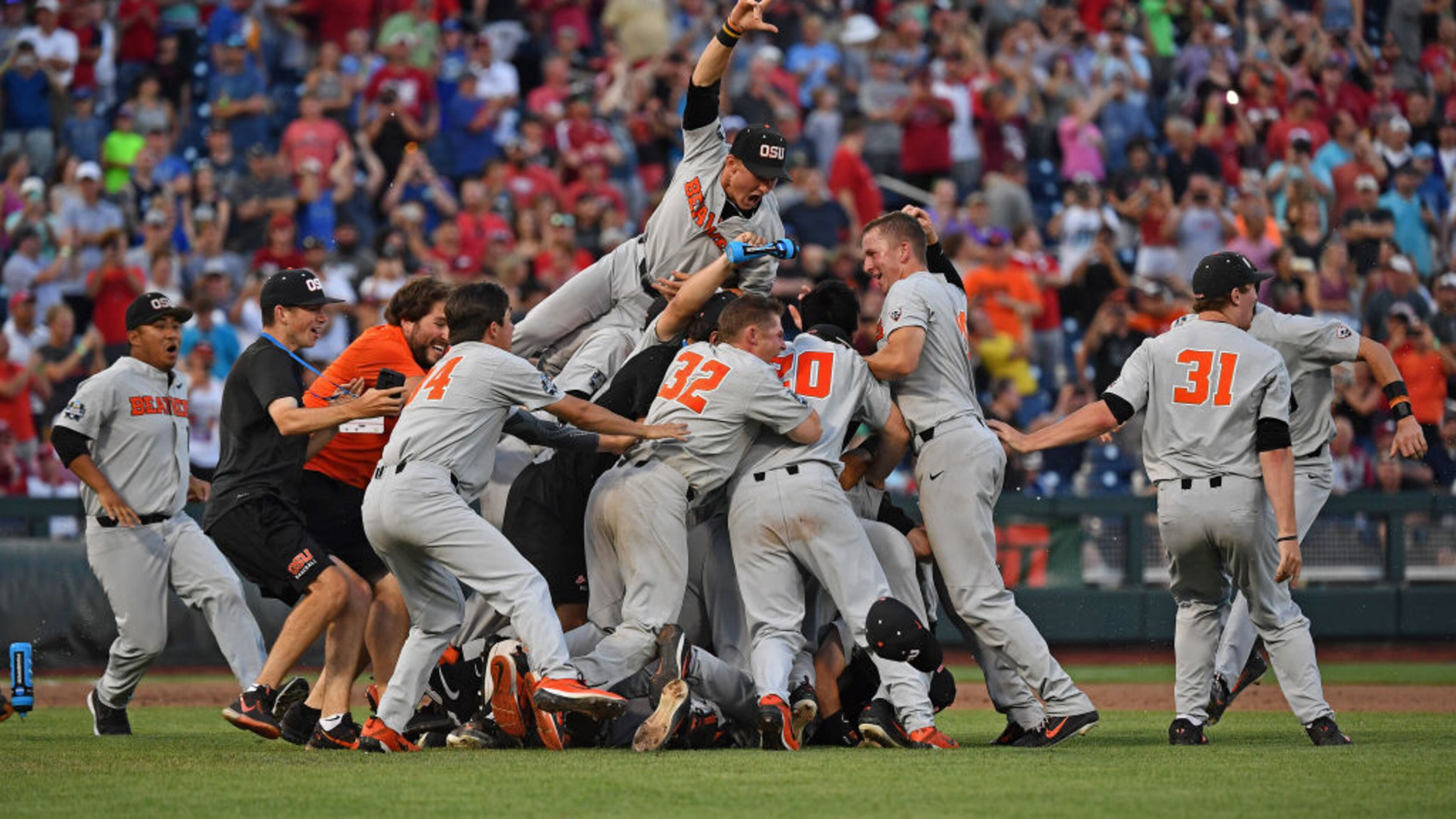 Oregon State players celebrate after winning the College World Series on Thursday night.