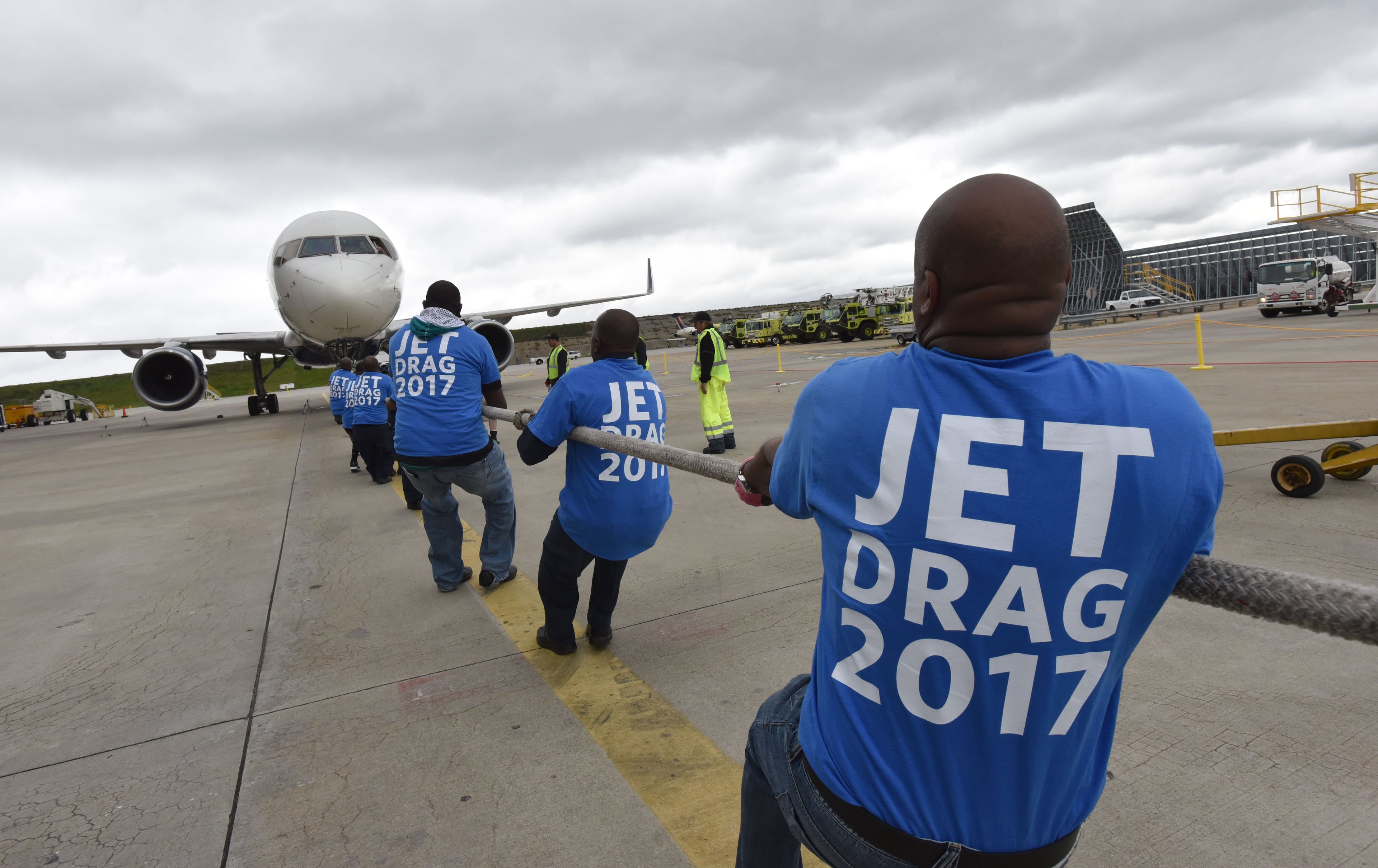 May 5, 2017 Atlanta - Team members participate in the Delta Jet Drag on Friday, May 5, 2017. Teams, of no more than 20 people are timed as they compete for prizes as they pull a 167,000-pound pound Boeing 757 aircraft for about 20 feet. When the Delta Jet Drag began eight years ago, Robert Cisneros signed up to pull that 167,000 pound plane. At first, participating in the fundraiser was just a way to support friends, coworkers and loved ones battling cancer. Then, when his mother was diagnosed, that passion turned into something more. HYOSUB SHIN / HSHIN@AJC.COM
