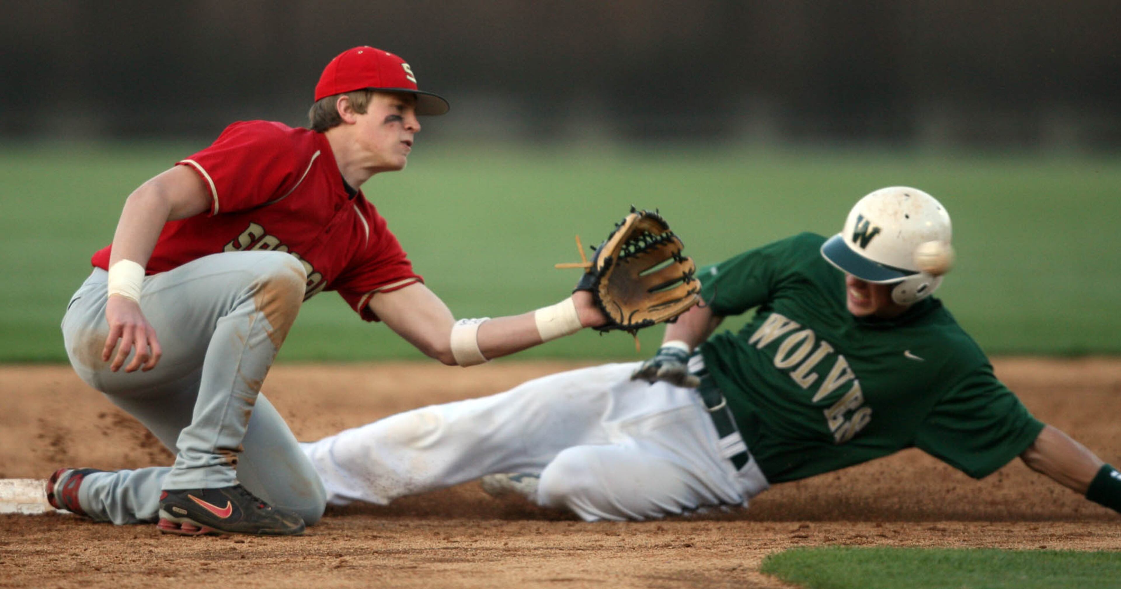 Wesleyan's Ian Davis (5) steals second base in a game vs. Greater Atlanta Christian School on March 25, 2008, in Norcross. (Jason Getz / AJC) Davis was the driver of a vehicle in a multiple-fatality crash in the early morning hours of June 29, 2014. The vehicle failed to stop at a stop sign and traveled approximately 451 feet before overturning several times in a church yard, according to Georgia State Patrol. Davis and former Auburn Tigers tight end Philip Lutzenkirchen died in the crash.