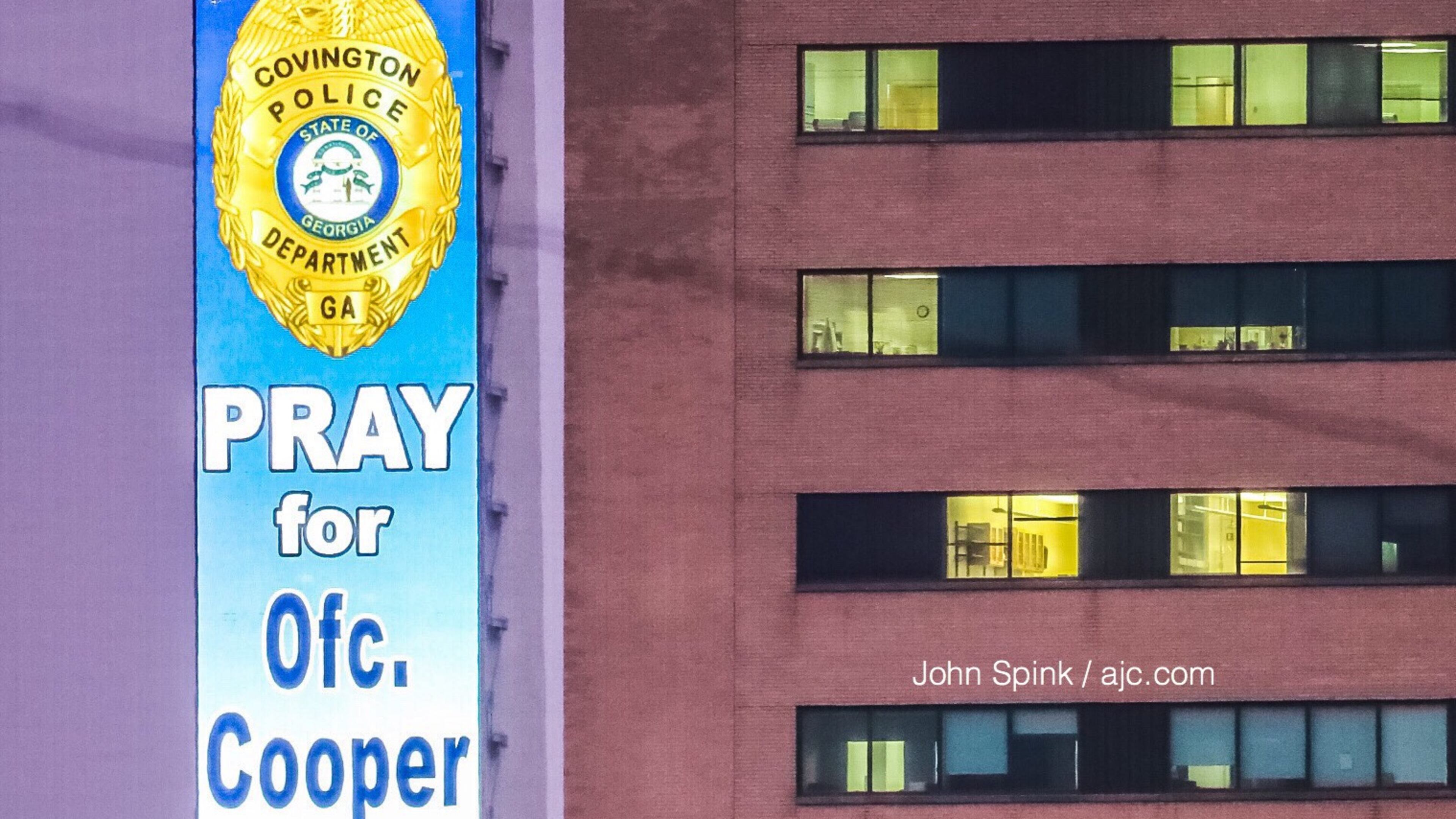 A message of support is displayed on the Corey Airport Advertising Tower on the Downtown Connector. The digital billboard is within view of wounded Covington police Officer Matt Cooper's room at Grady Memorial Hospital.