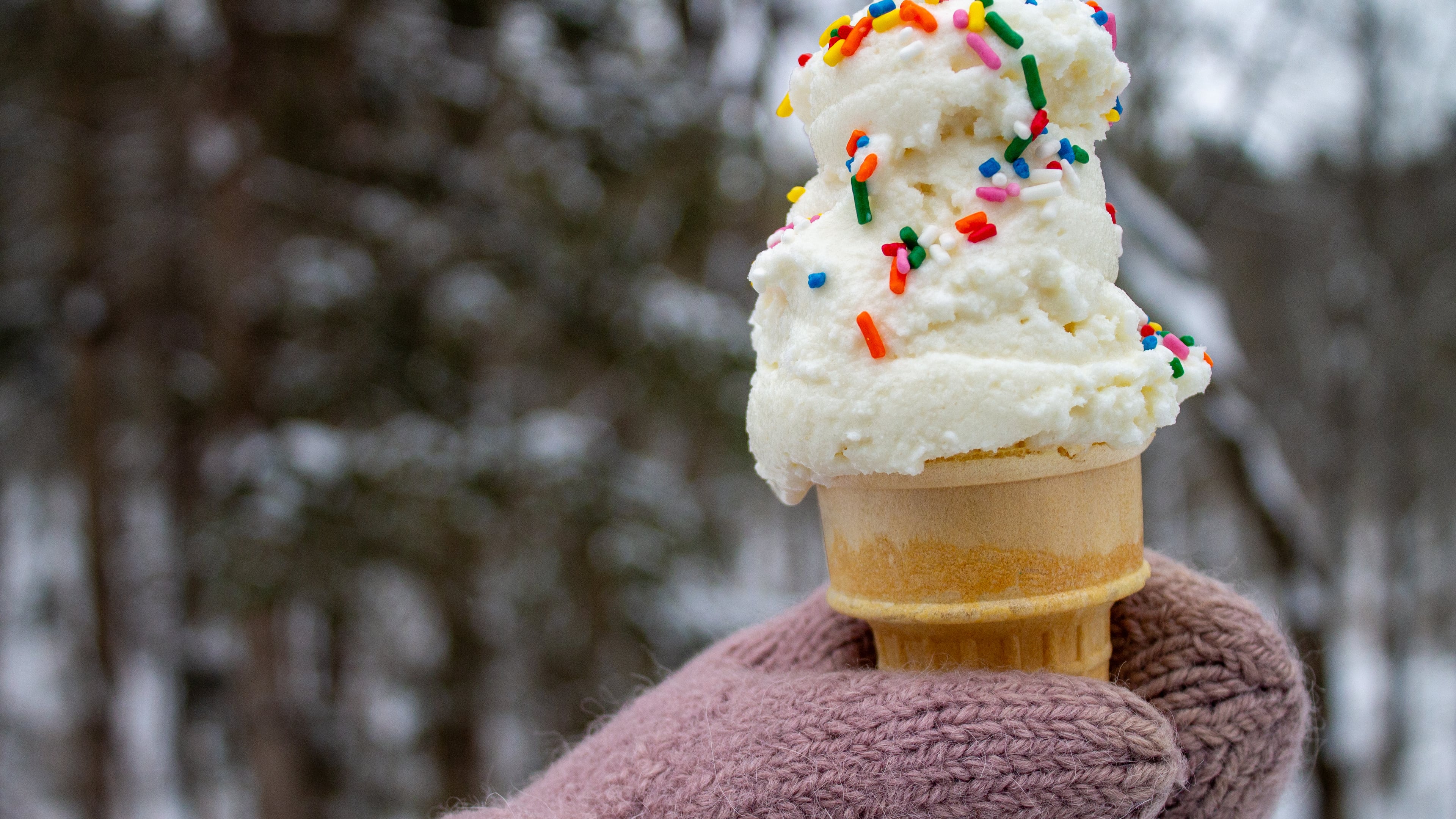 A cone of snow cream, made by mixing sweetened condensed milk with fresh snow, is seen Tuesday, Jan. 27, 2026, in Bow, N.H. (AP Photo/Holly Ramer)