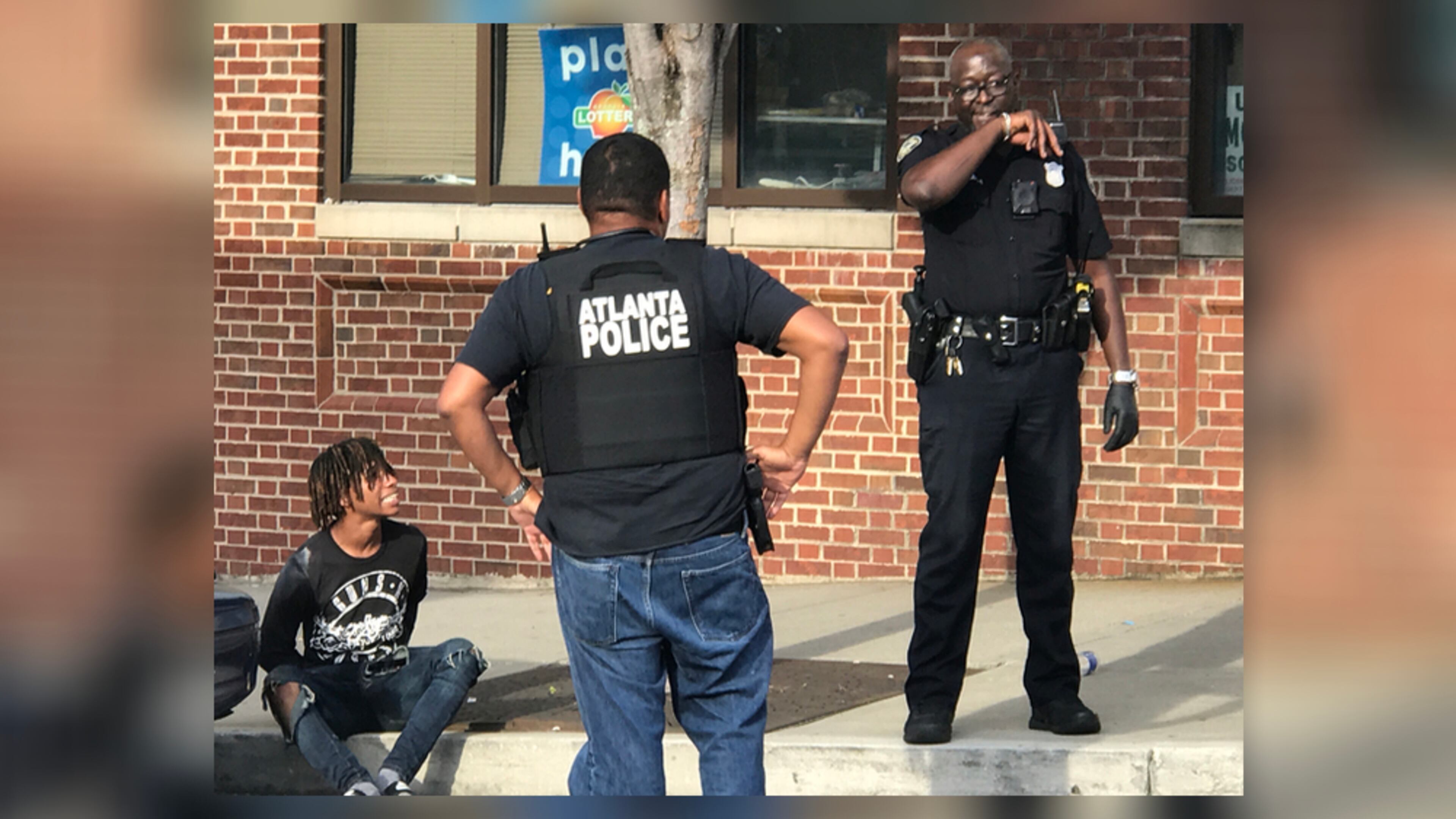 Atlanta police detained a carjacking suspect outside the Lindbergh MARTA train station. (Credit: Rosalind Bentley / AJC)