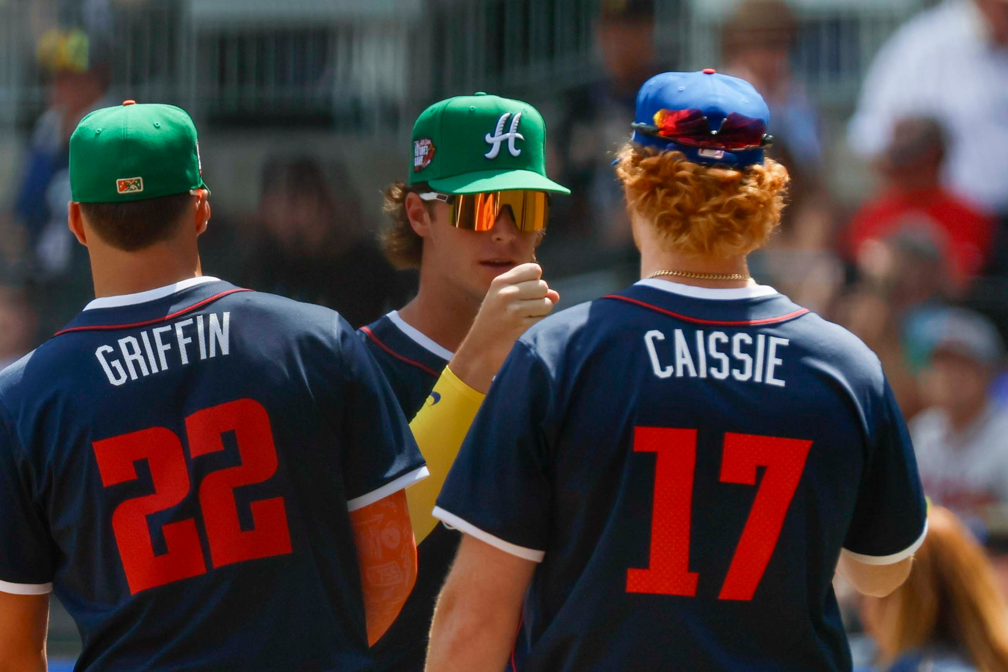 National League infielder Charlie Condon (24), center, greets teammates before the MLB All-Star Futures Game at Truist Park on Saturday, July 12, 2025, in Atlanta.
(Miguel Martinez/ AJC)