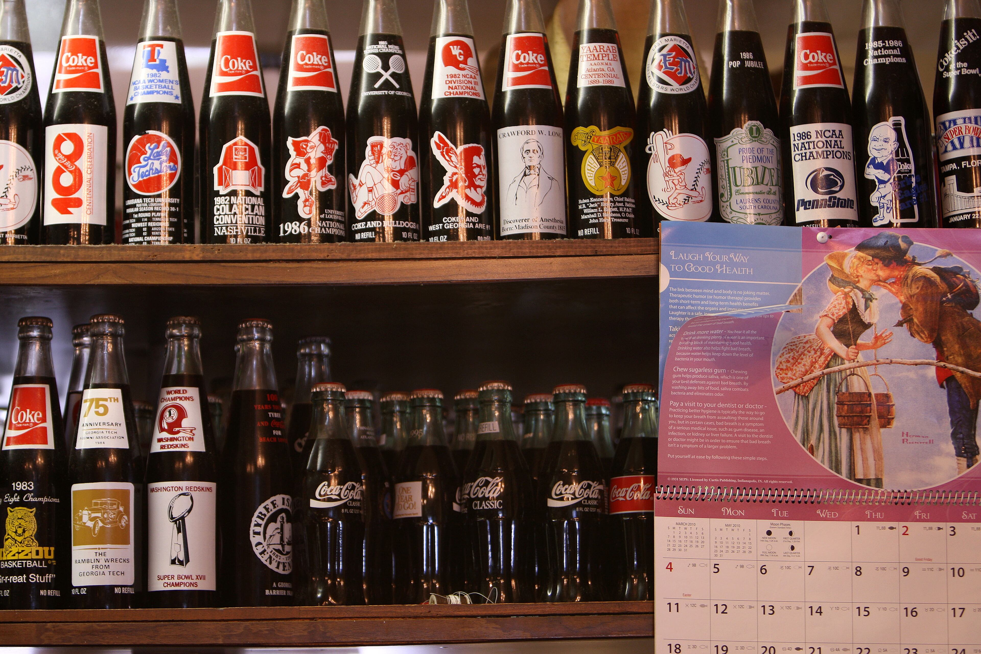 Bottles of Coke kept above the counter were from customers through the years, according to Judy Shelnutt, daughter of Bobby and June Crowe. / AJC file photo