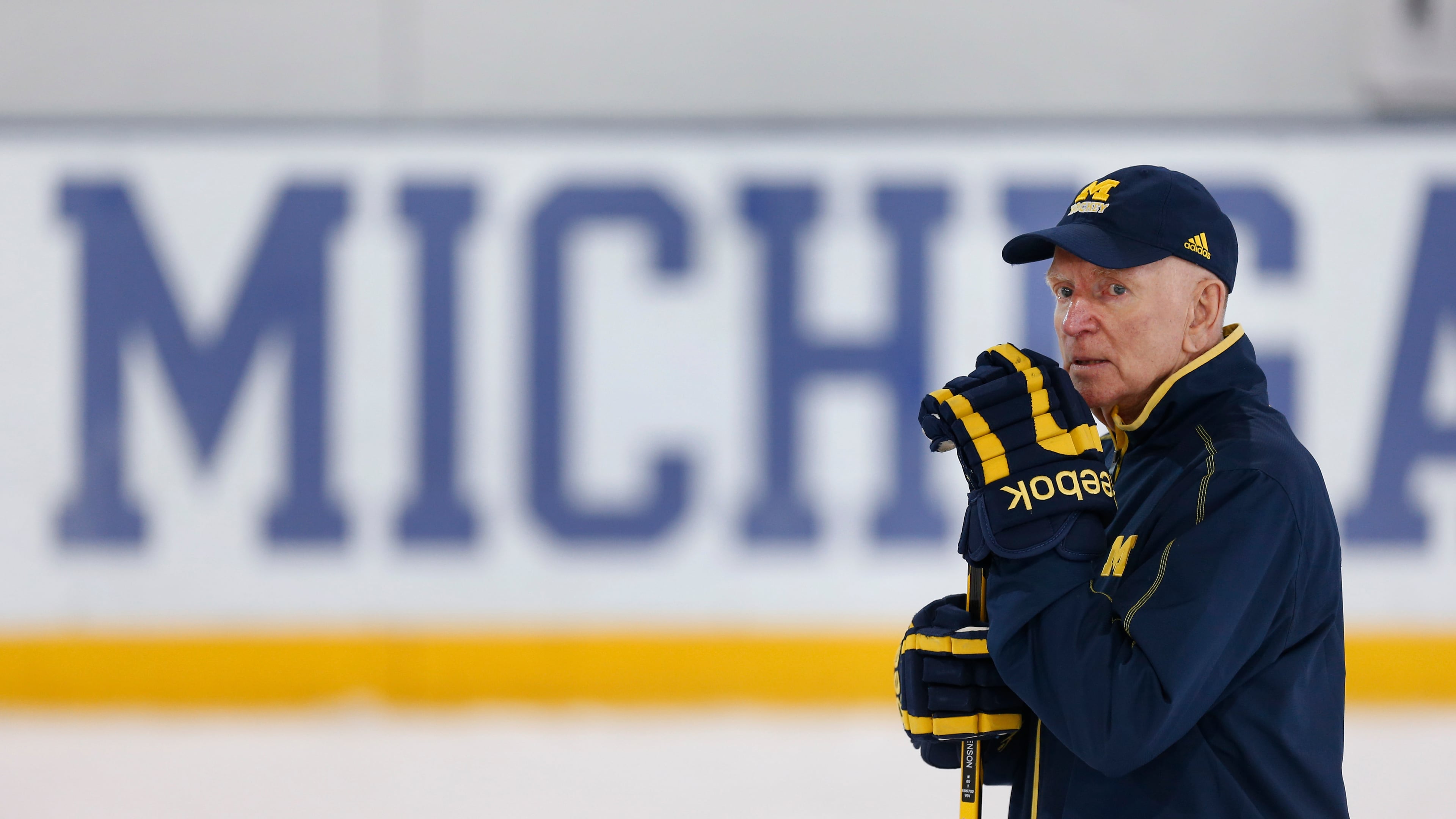 FILE - Michigan hockey coach Red Berenson watches NCAA college hockey practice in Ann Arbor, Mich., Tuesday, March 22, 2016. (AP Photo/Paul Sancya, File)