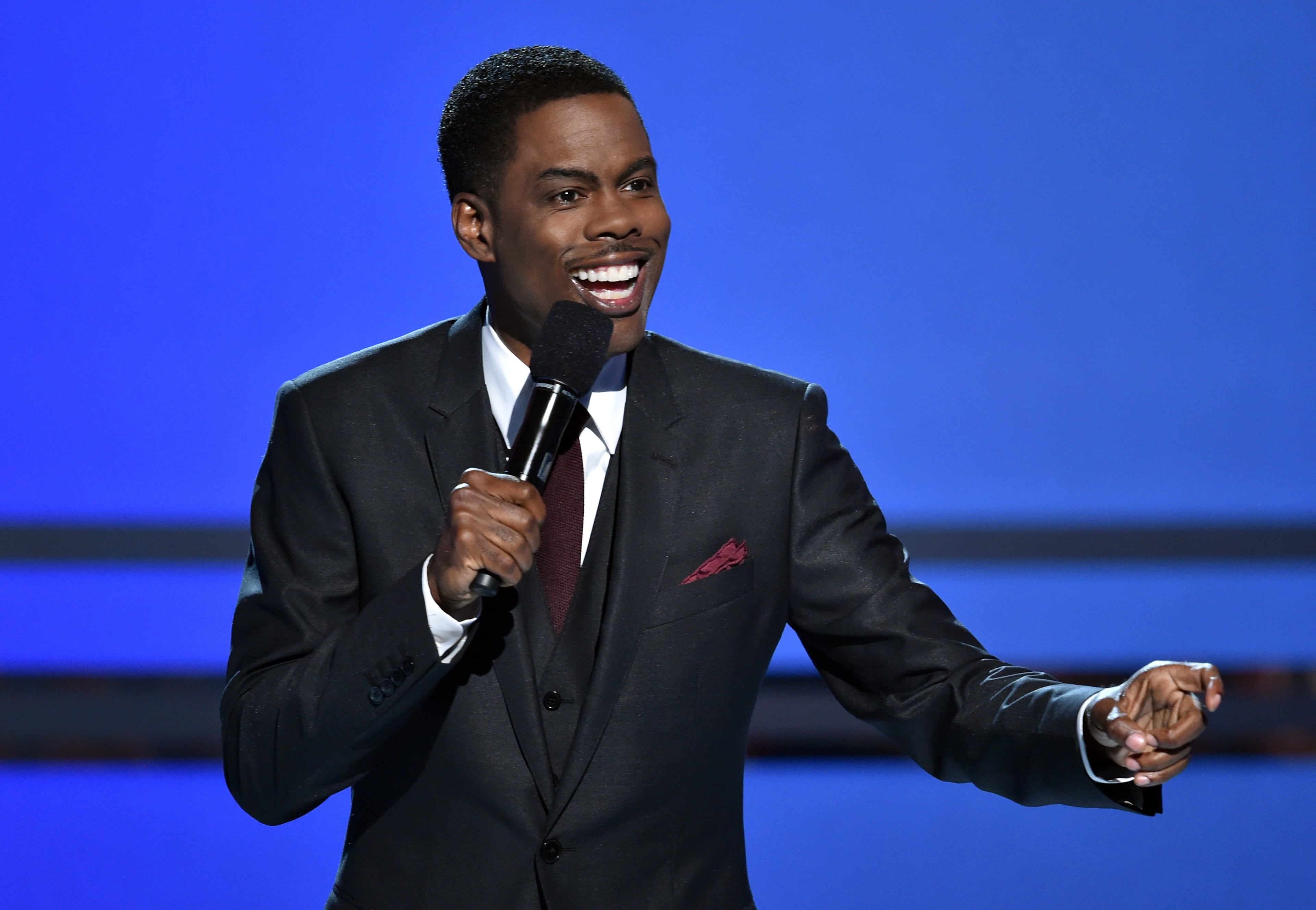 LOS ANGELES, CA - JUNE 29: Host Chris Rock speaks onstage during the BET AWARDS '14 at Nokia Theatre L.A. LIVE on June 29, 2014 in Los Angeles, California. (Photo by Kevin Winter/Getty Images for BET)