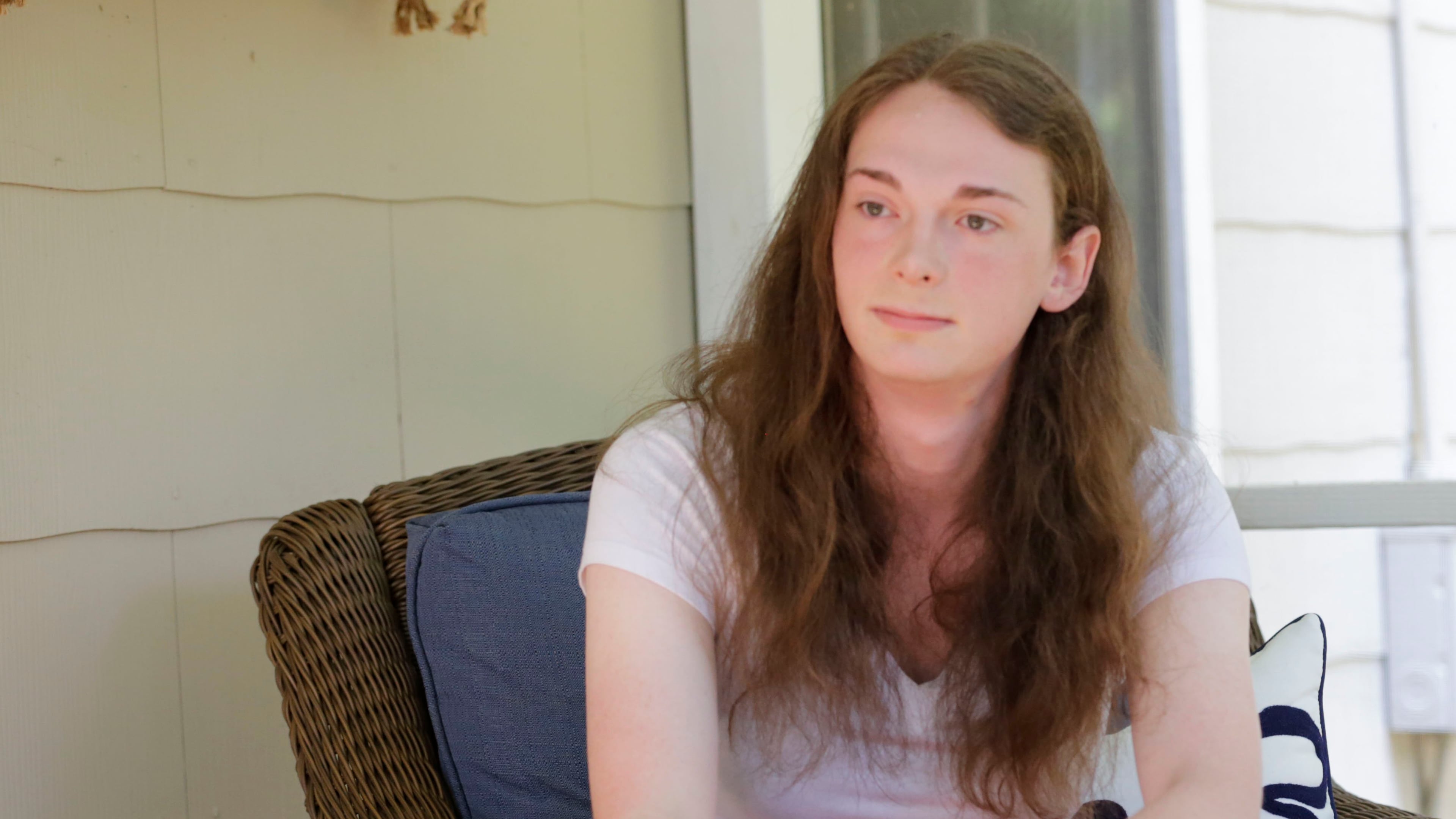 Rose is a transgender student who graduated from Druid Hills HS in May. Sitting on her back porch, she talked about the difficulty of being a transgender student in high school and the challenges ahead. BOB ANDRES / BANDRES@AJC.COM
