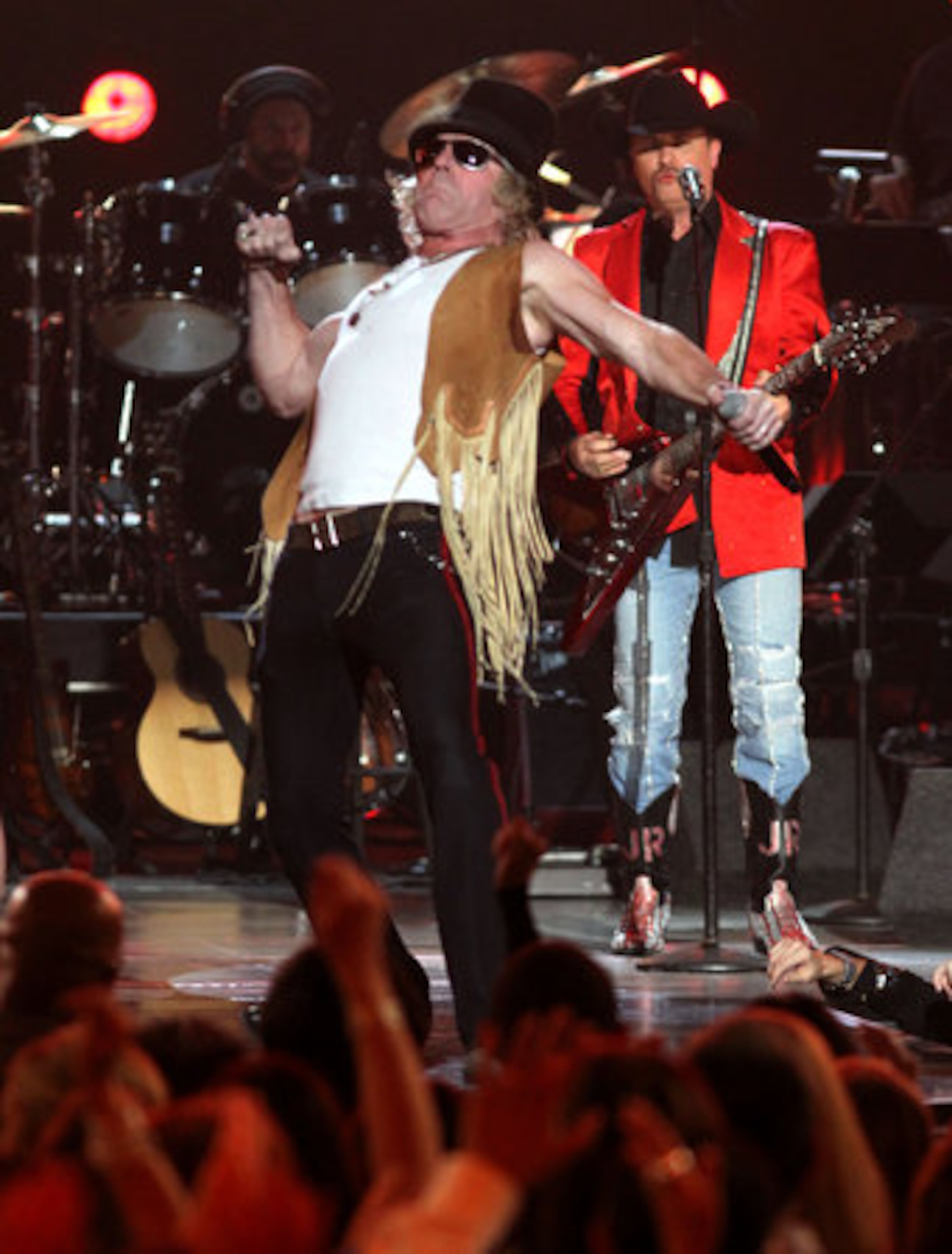 Big Kenny, left, and John Rich, of musical group Big & Rich, perform "Brick House" at ACM Presents: Lionel Richie and Friends in Concert on Monday April 2, 2012 in Las Vegas.