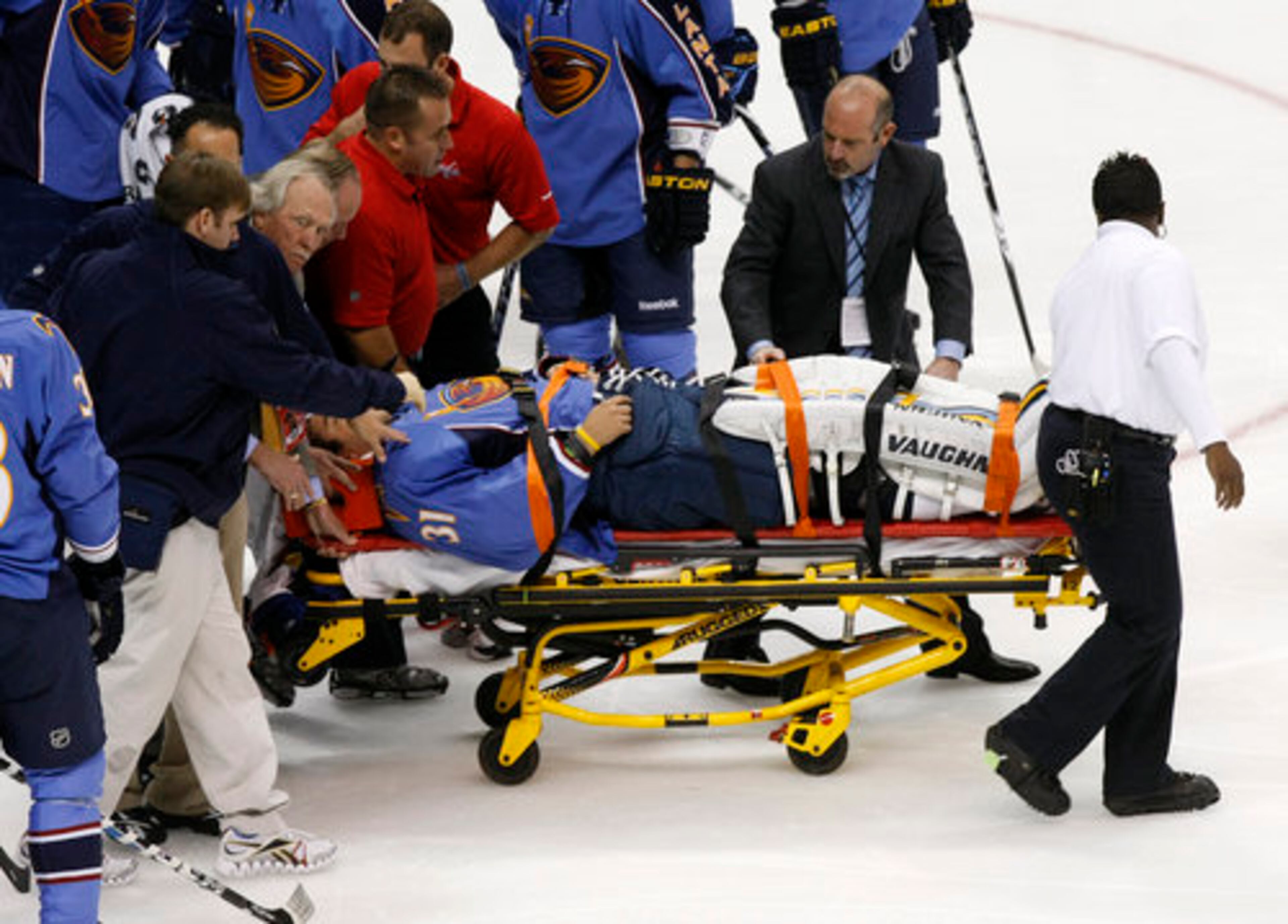 The Atlanta Thrashers goalie Ondrej Pavelec is removed from the ice on a stretcher after collapsing to the ice during 1st period action on opening night of the 2010-11 season while hosting their Southeast Division rival Washington Capitals at Philips Arena in Atlanta on Friday, Oct. 8, 2010.