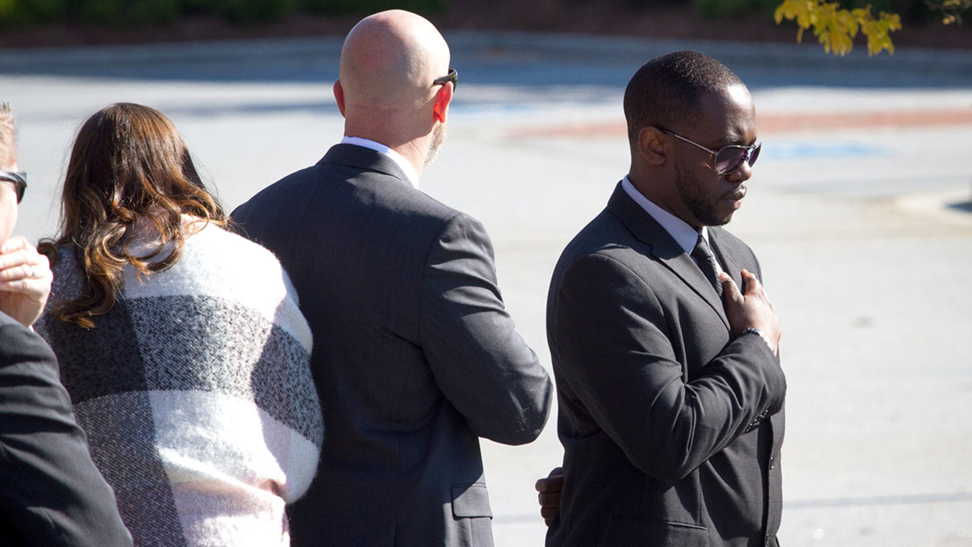People line the street as the official motorcade makes it's way into the Greater Atlanta Christian School for the start of the Memorial Service for U.S. Marshals Service Deputy Commander Patrick Carothers in Norcross, GA November 26, 2016. U.S. Marshals Service Deputy Commander Patrick Carothers was fatally shot by a wanted fugitive November 18, 2016.
STEVE SCHAEFER / SPECIAL TO THE AJC