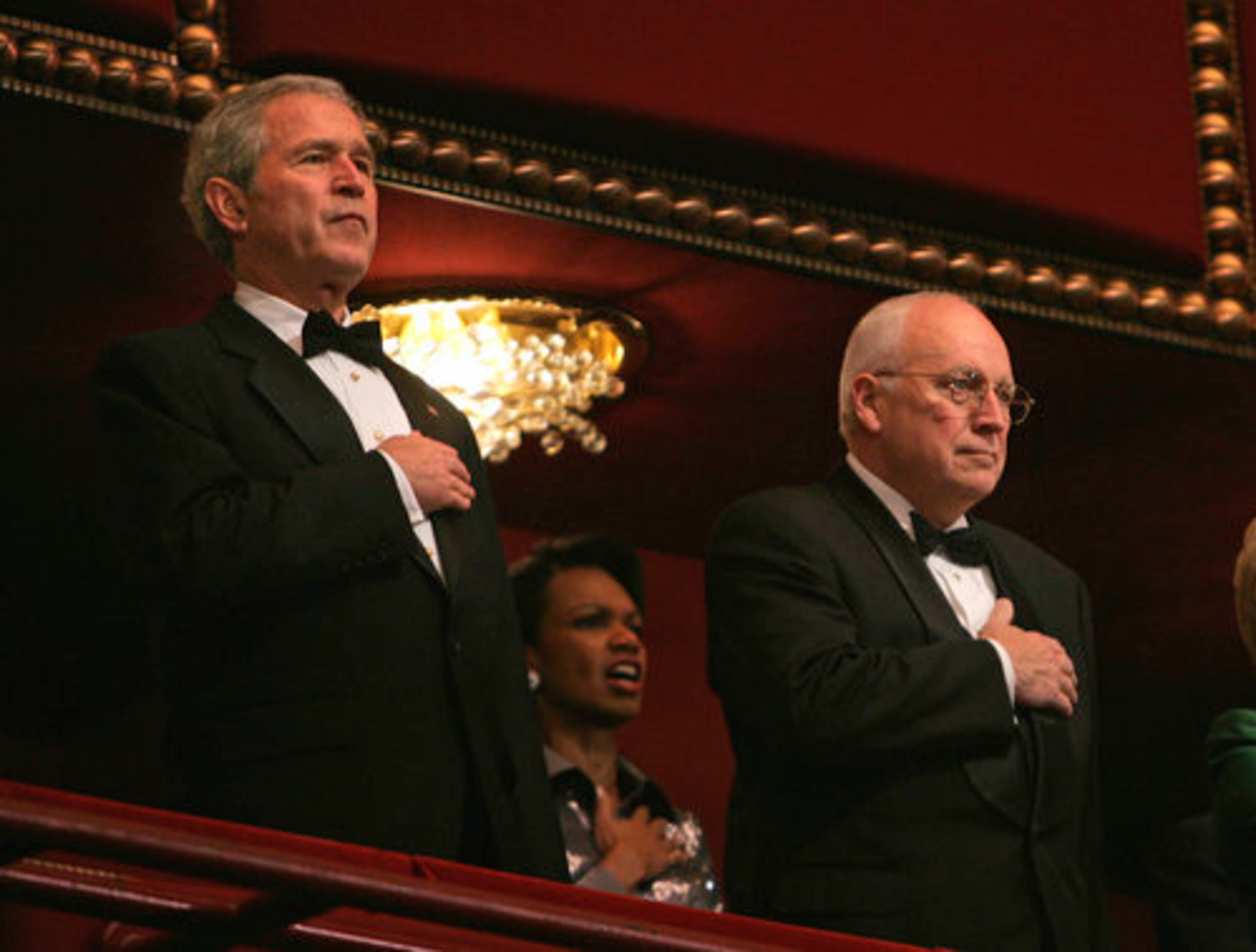 President George W. Bush and Vice President Dick Cheney listen to the anthem before the ceremony. The honors recognize people who have helped define American culture through the performing arts.