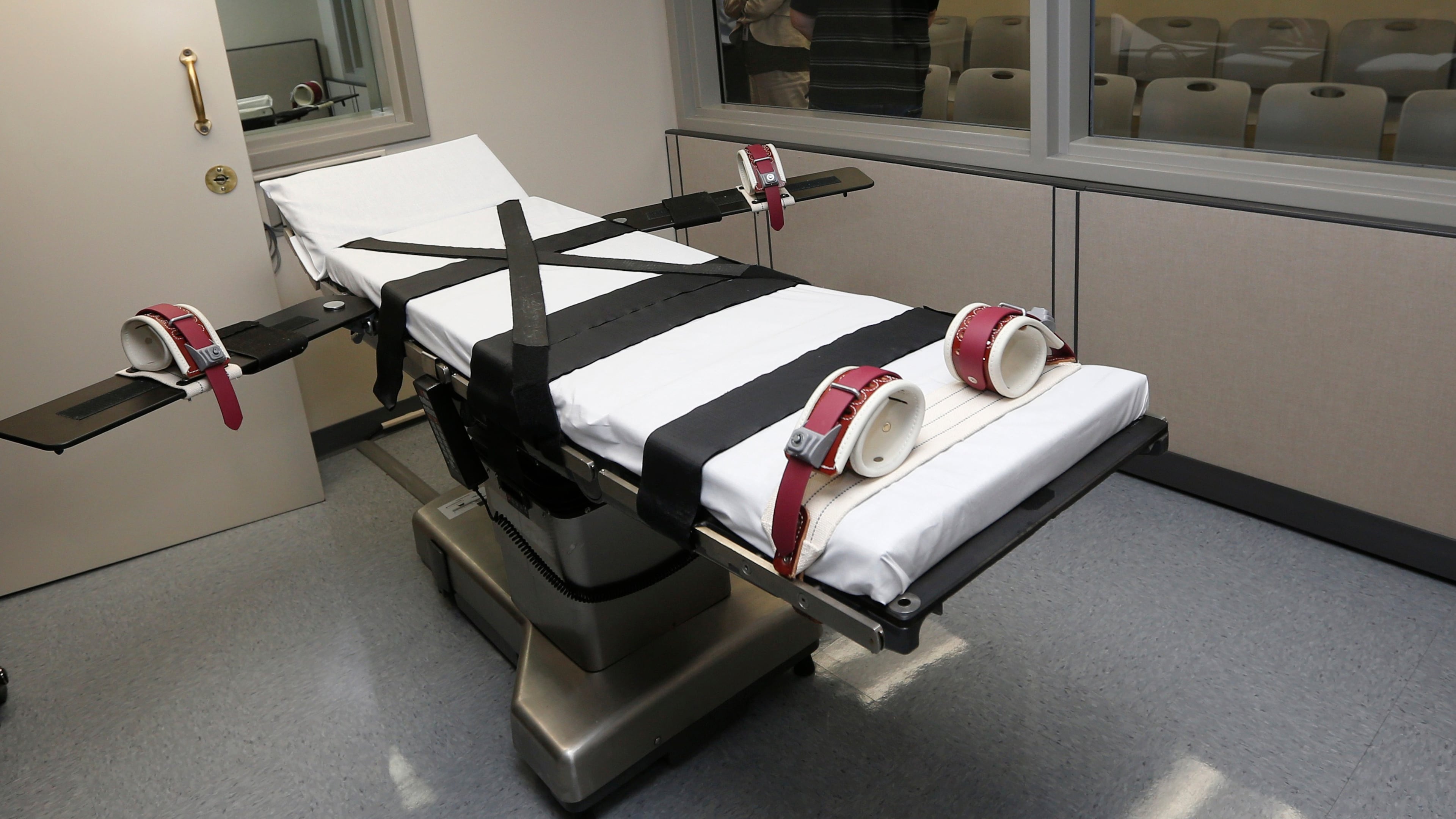 FILE - This Oct. 9, 2014, file photo shows the gurney in the the execution chamber at the Oklahoma State Penitentiary in McAlester, Okla. (AP Photo/Sue Ogrocki, File)