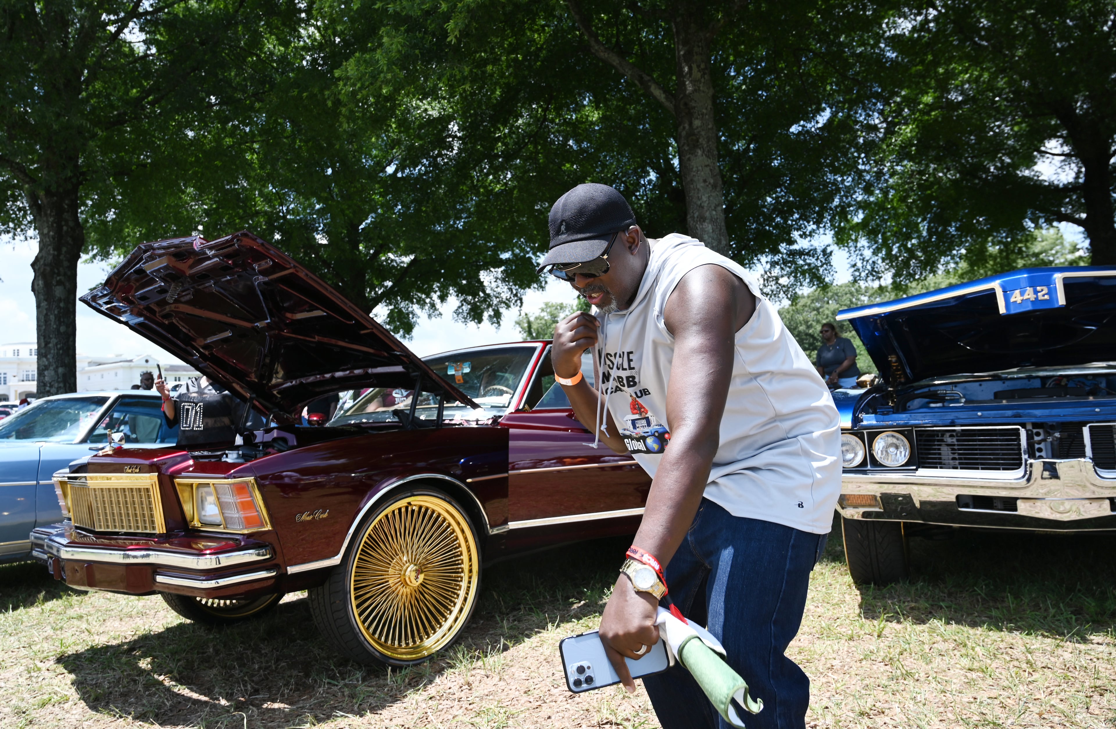Eddie ED, also known as Muscle Mobb, dances during the 4th Annual Rick Ross Car and Bike Show, Saturday, June 7, 2025, in Fayetteville. The 4th Annual Rick Ross Car and Bike Show will include a vendor market with more than 30 vendors, food trucks, fleets of classic/custom automobiles, luxury vehicles, boats, RVs and trailers on the front of the mansion. Stage performances include Plies, Ross' new signee Nino Breeze and Ross himself. (Hyosub Shin / AJC)